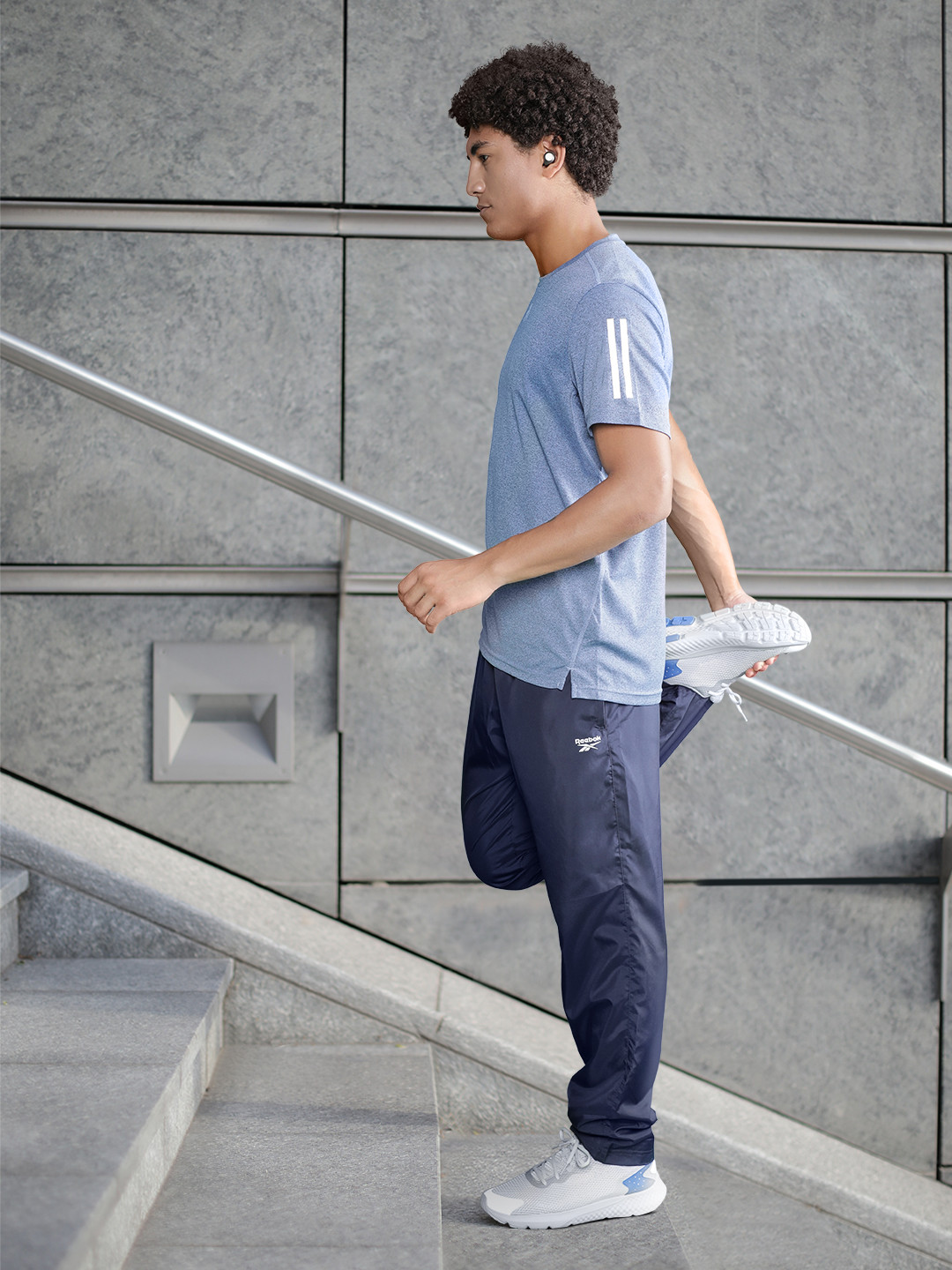 Reebok Men Navy Blue Solid TE WVN OH Training Track Pants