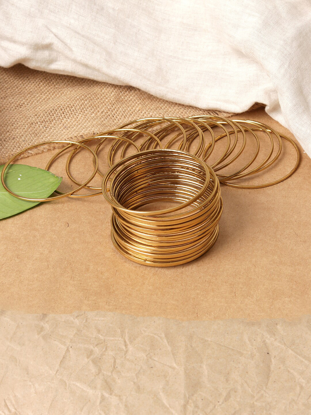 ToniQ Set Of 18 Gold-Plated Antique Bangles