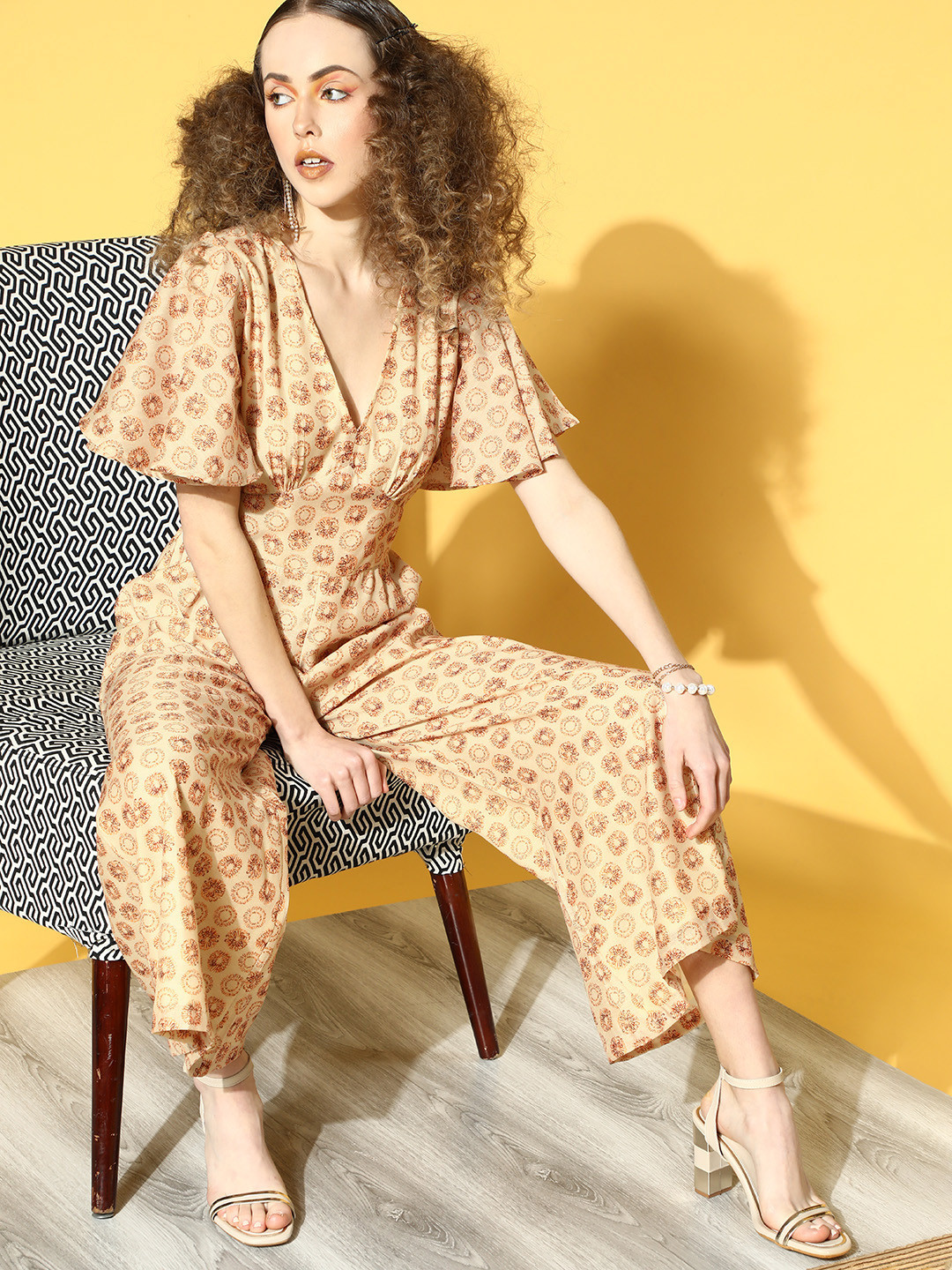 anayna Women Classy Beige Printed Flutter Sleeves Jumpsuit
