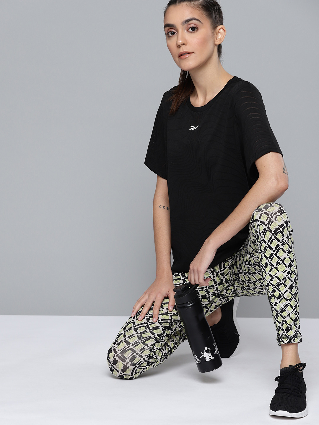 Reebok Women Black Self Design Speedwick Training Burnout T-Shirt