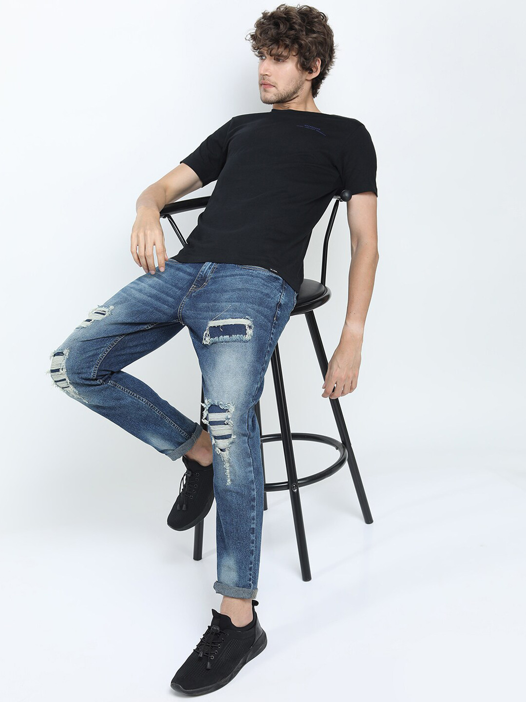 HIGHLANDER Men Blue Tapered Fit Mildly Distressed Heavy Fade Stretchable Ripped Jeans