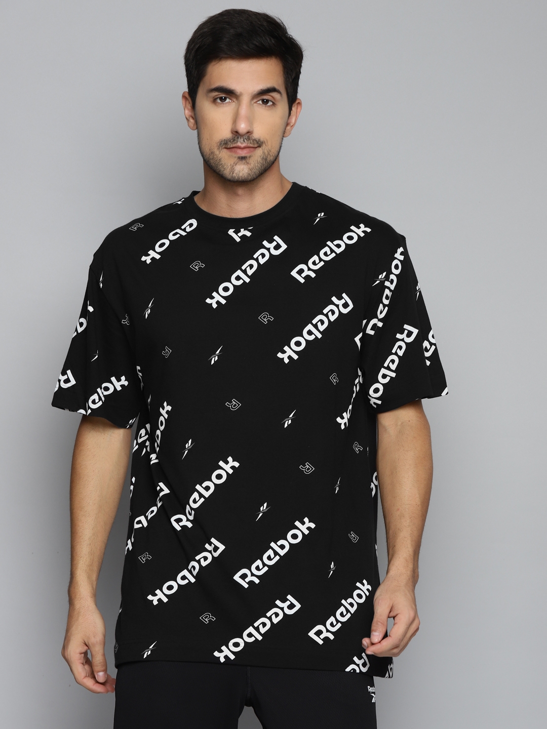 Reebok Unisex Black & White All Over Print Drop-Shoulder Sleeves Training T-shirt