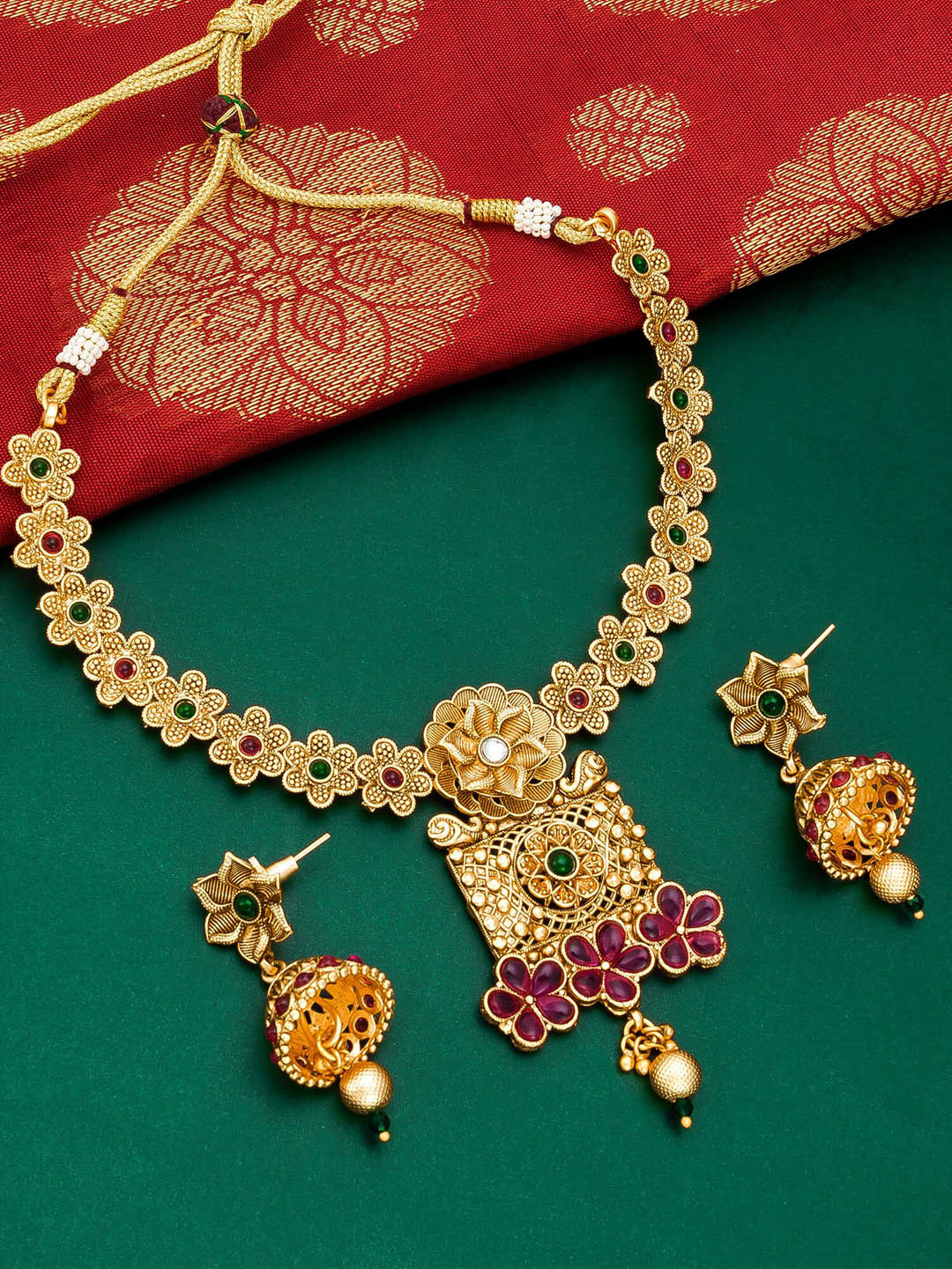 aadita Gold Plated & Pink Studded Jewellery Set