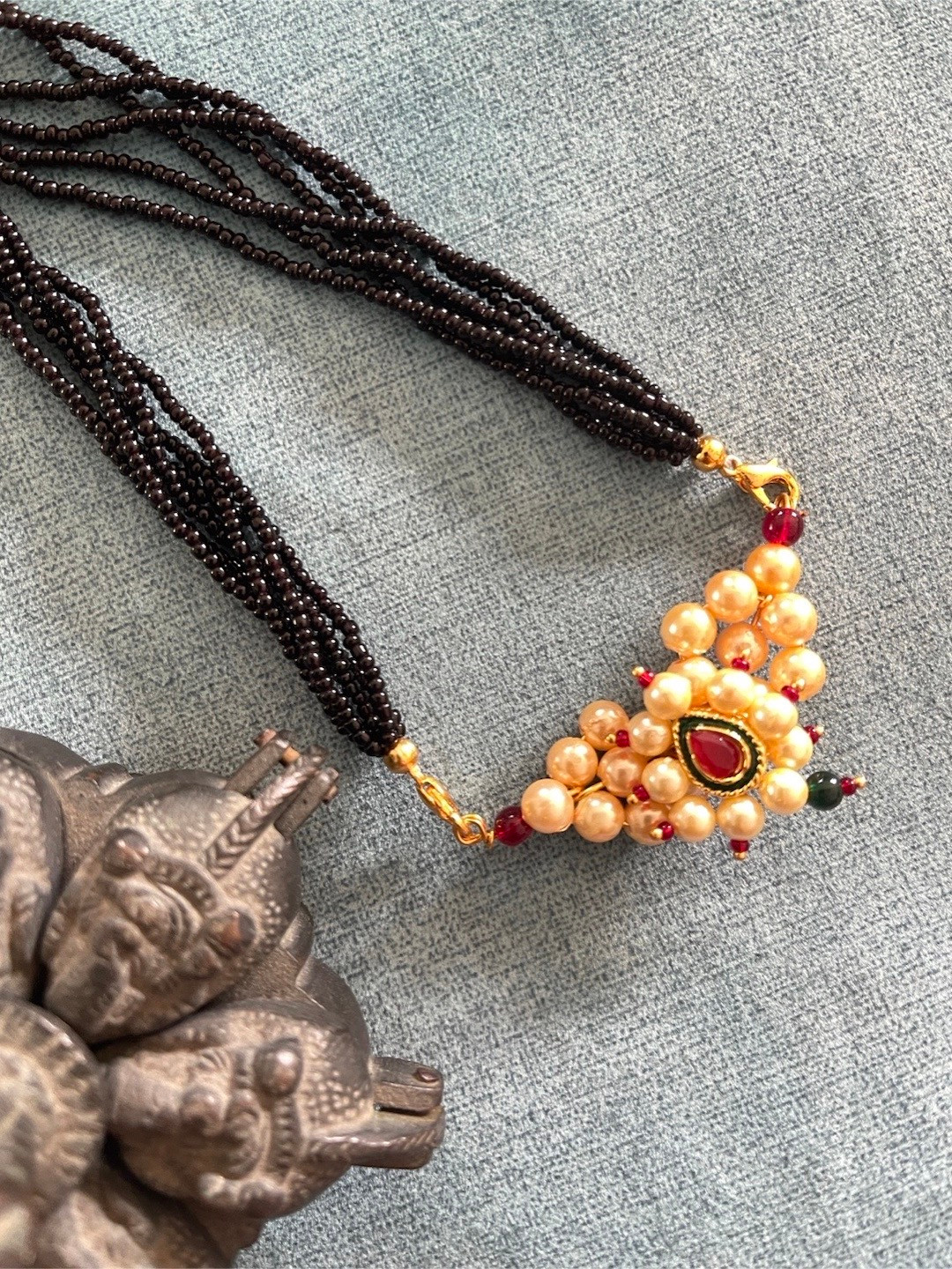 Digital Dress Room Gold-Plated Red Stone Studded & Black Beaded Mangalsutra