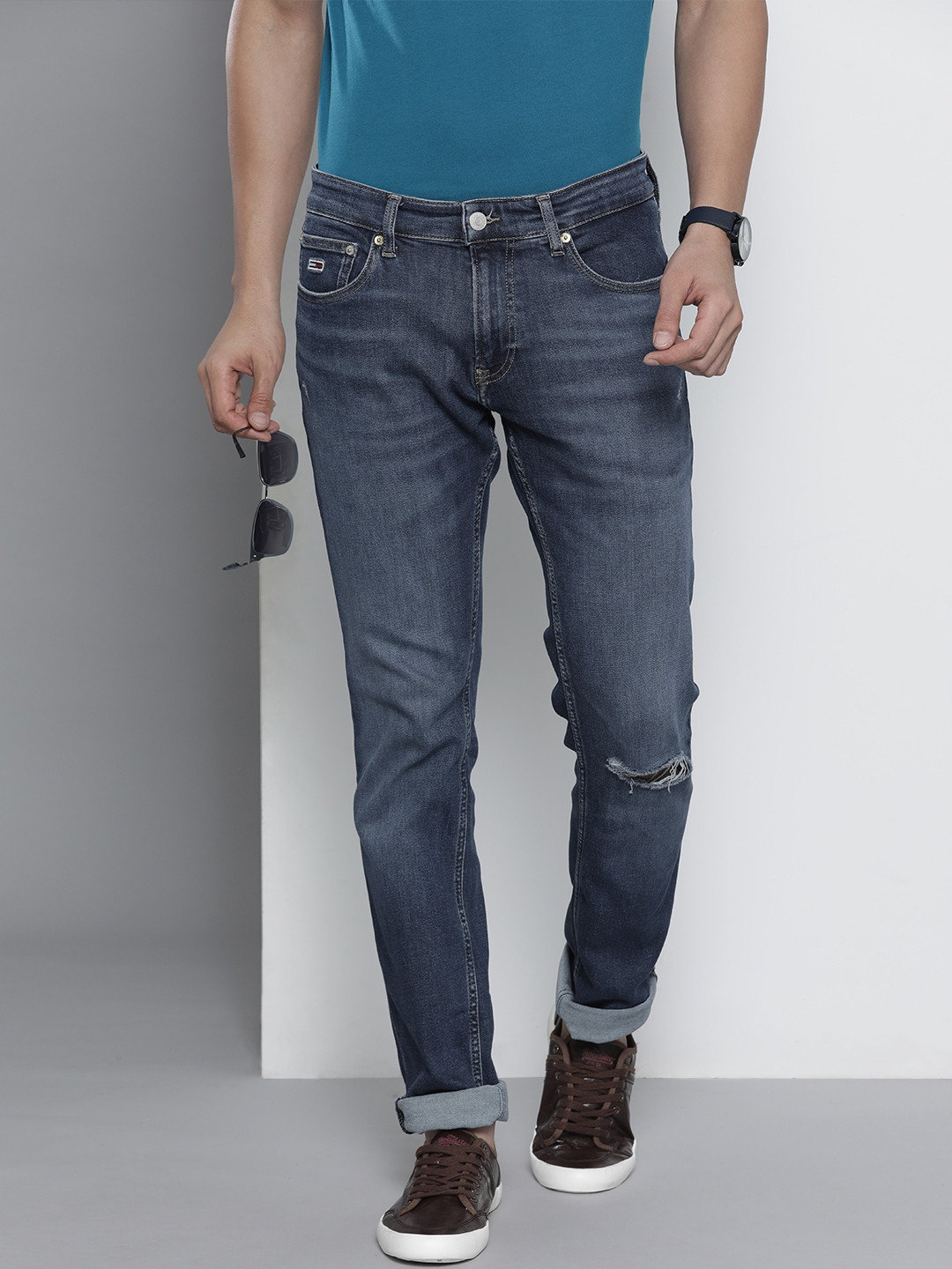 Tommy Hilfiger Men Blue Slim Fit Mildly Distressed Mid-Rise Light Fade Stretchable Jeans