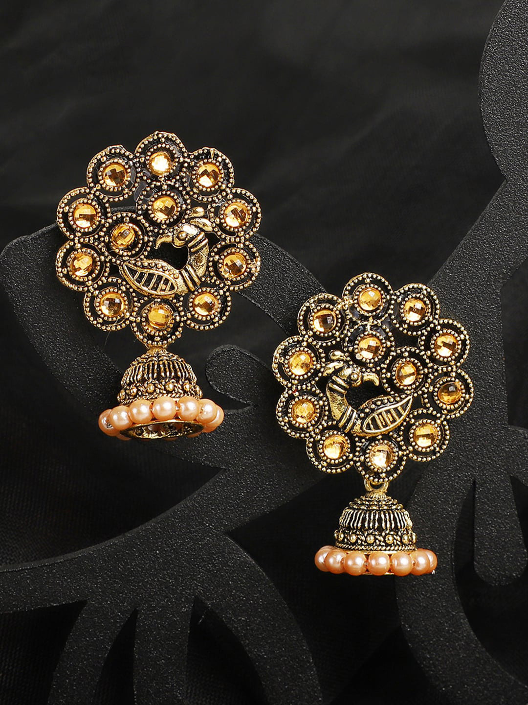 ANIKAS CREATION Antique Peacock Gold Plated Jhumka Earrings