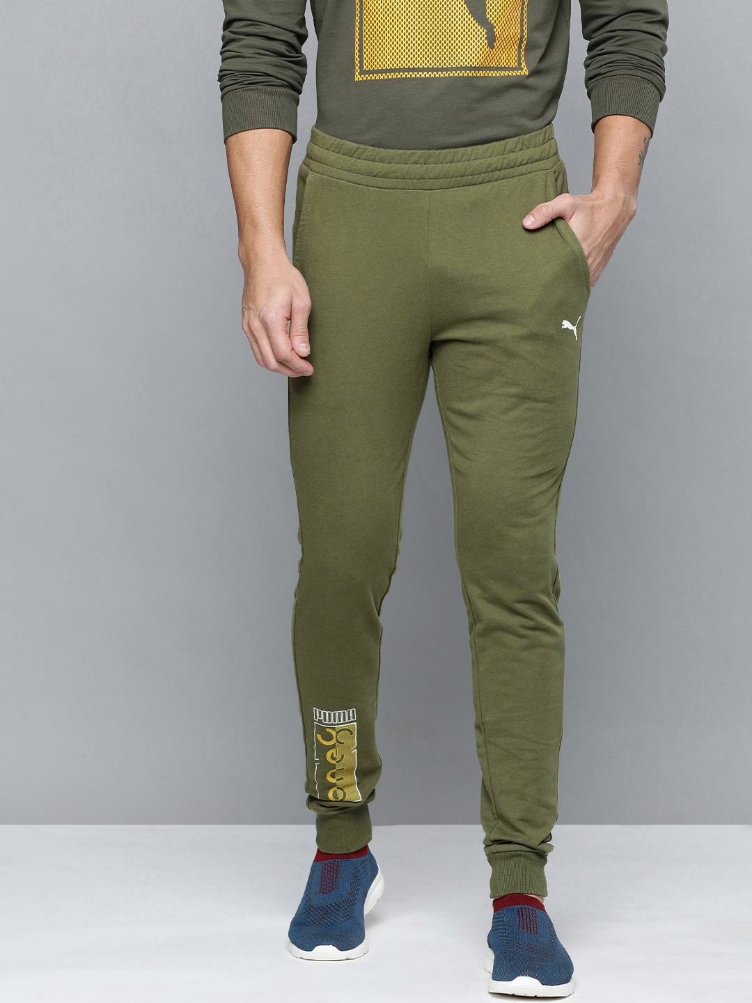 Buy Puma x One8 Men Olive Green Brand Logo Printed Mid Rise Graphic Regular Joggers Track Pants for Men 17394968 Myntra