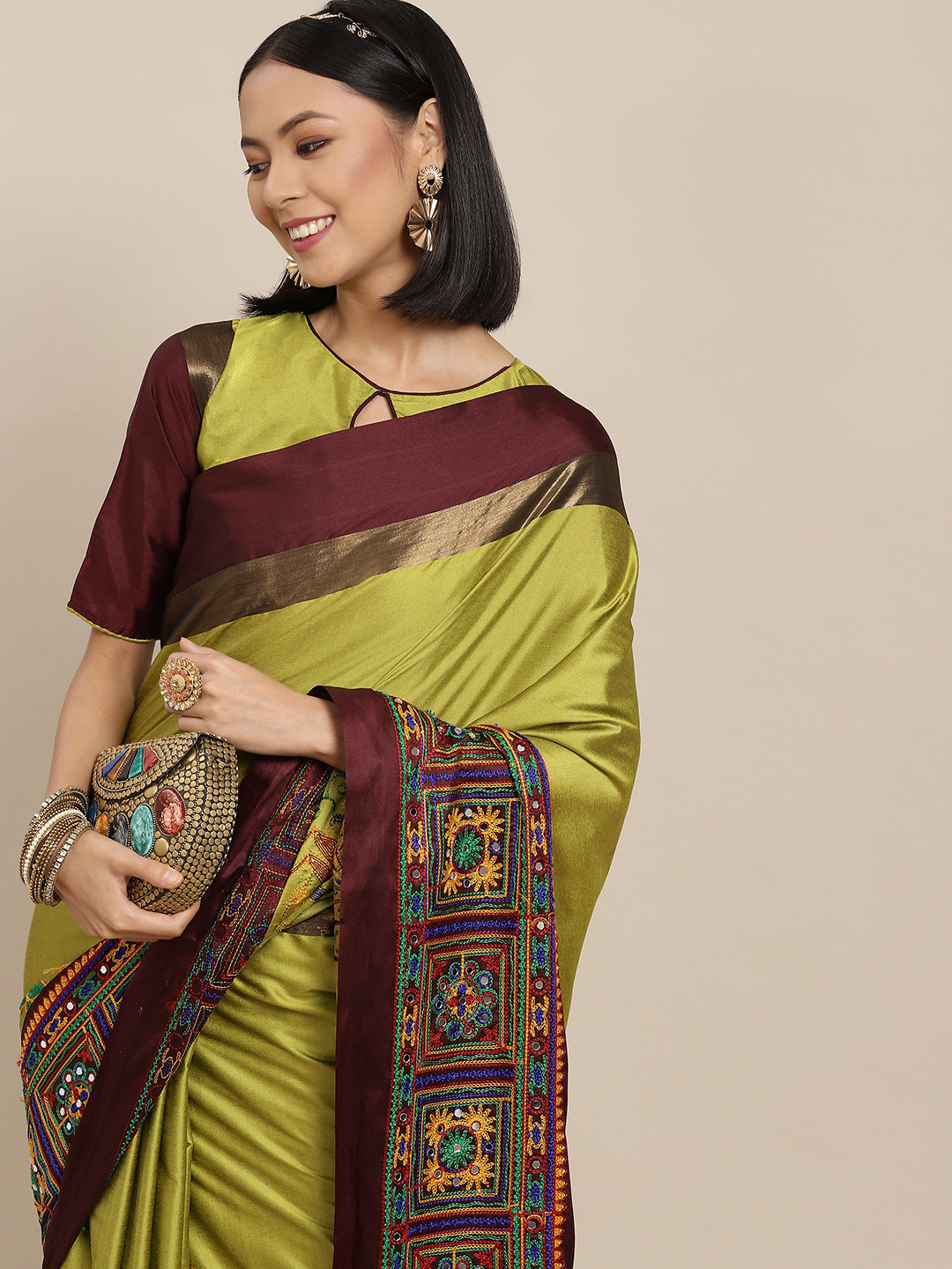 Mitera Green & Fuchsia Embellished Kutchi Embroidery Saree