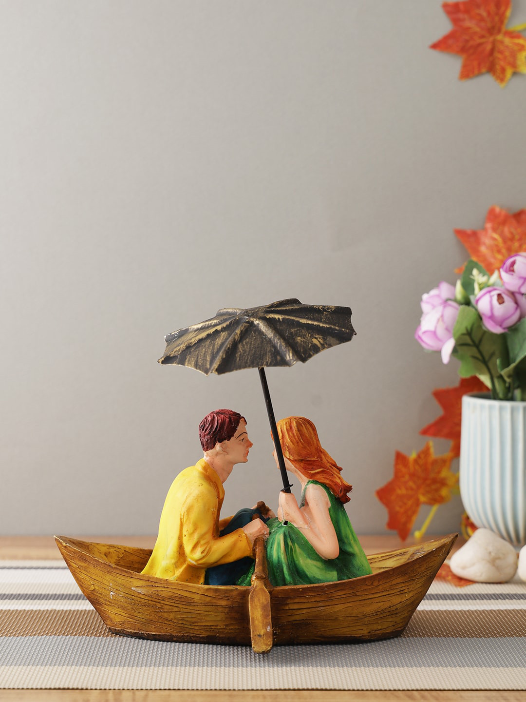 CraftVatika Romantic Love Couple on Boat Multicoloured Polyresin Natural Home Office Small Showpiece - 8.3 Inches