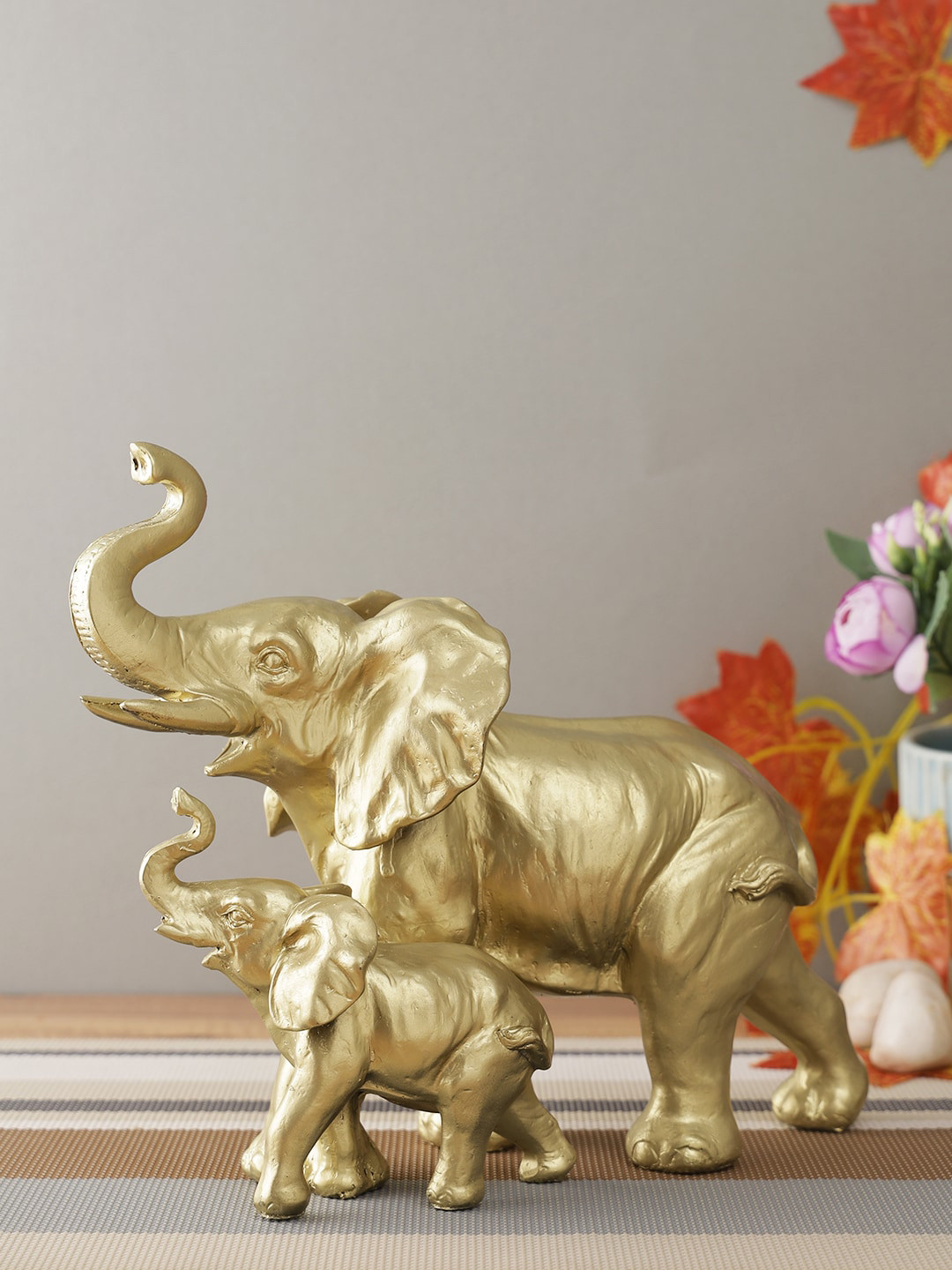 CraftVatika Gold-Toned Mother Elephant with Baby Showpiece