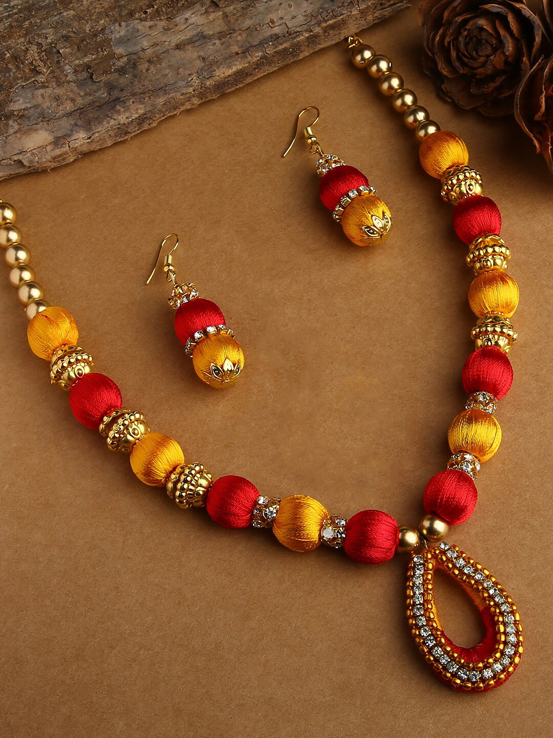 AKSHARA Girls Gold-Plated Yellow & Red Stone-Studded & Beaded Silk Thread Jewellery Set