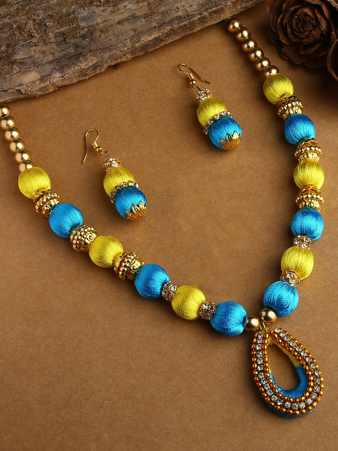 AKSHARA Gold-Plated Yellow & Blue Stone-Studded & Beaded Wooden Balls Silk Thread Jewellery Set