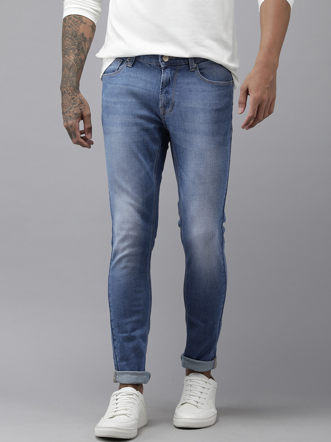 SPYKAR Men Blue Super Skinny Slim Fit Low-Rise Tapered Leg Light Fade Stretchable Jeans