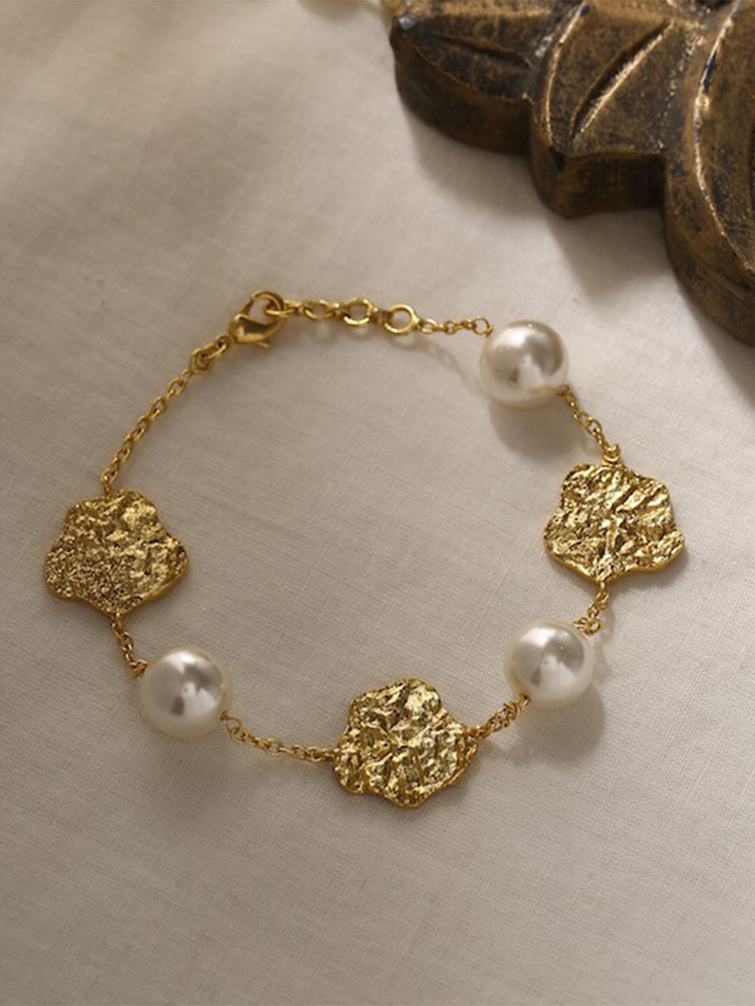 Mitali Jain Women Gold-Toned & White Brass Pearls Gold-Plated Bangle-Style Bracelet