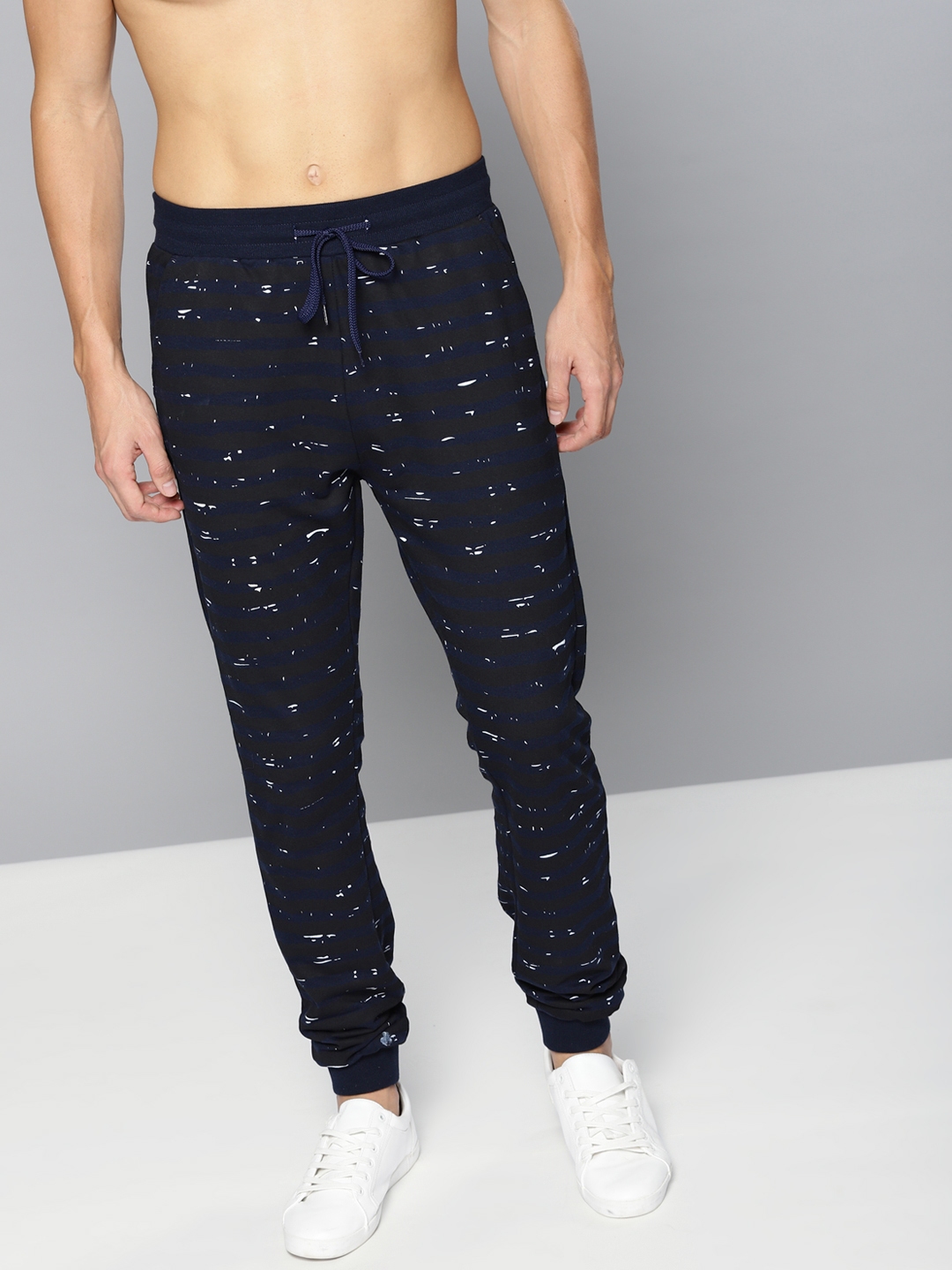 black joggers with blue stripe