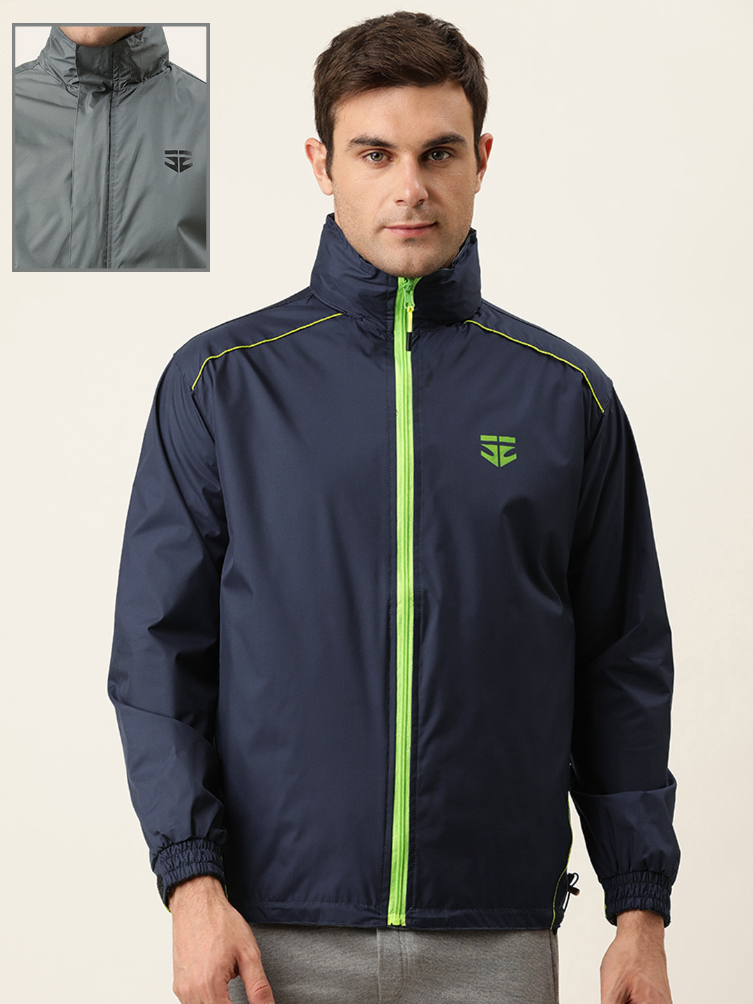 Sports52 wear Men Blue And Grey Solid Reversible Rain Jacket
