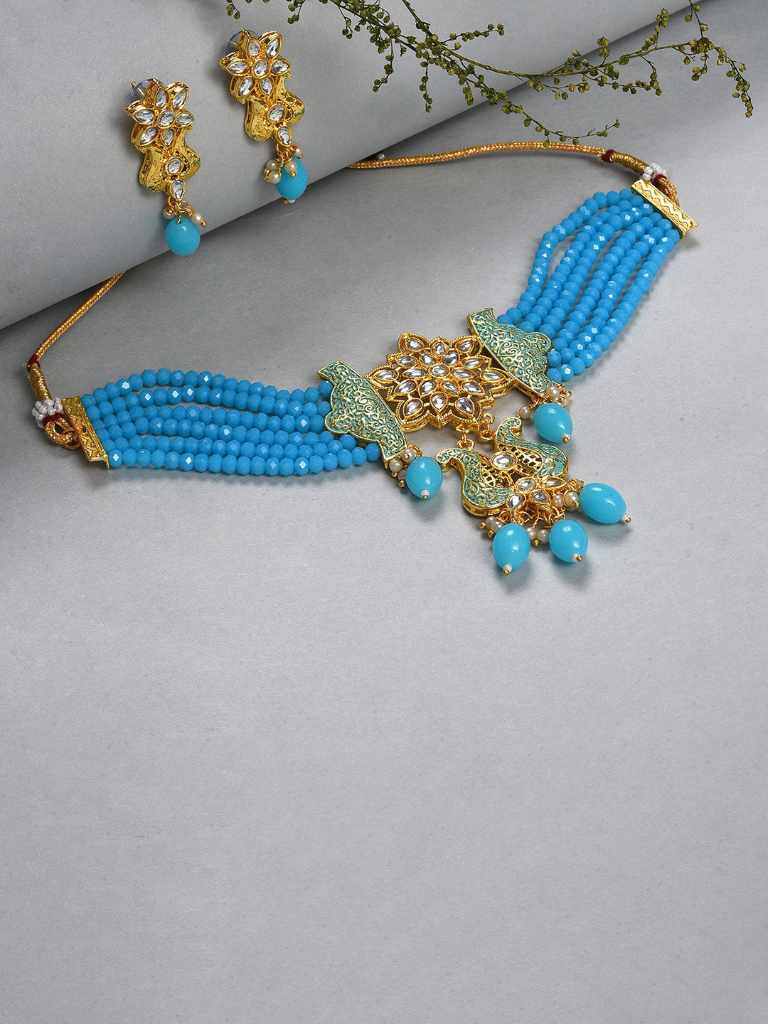 SOHI Gold-Plated Blue & White Artificial Stone Studded & Beaded Jewellery Set