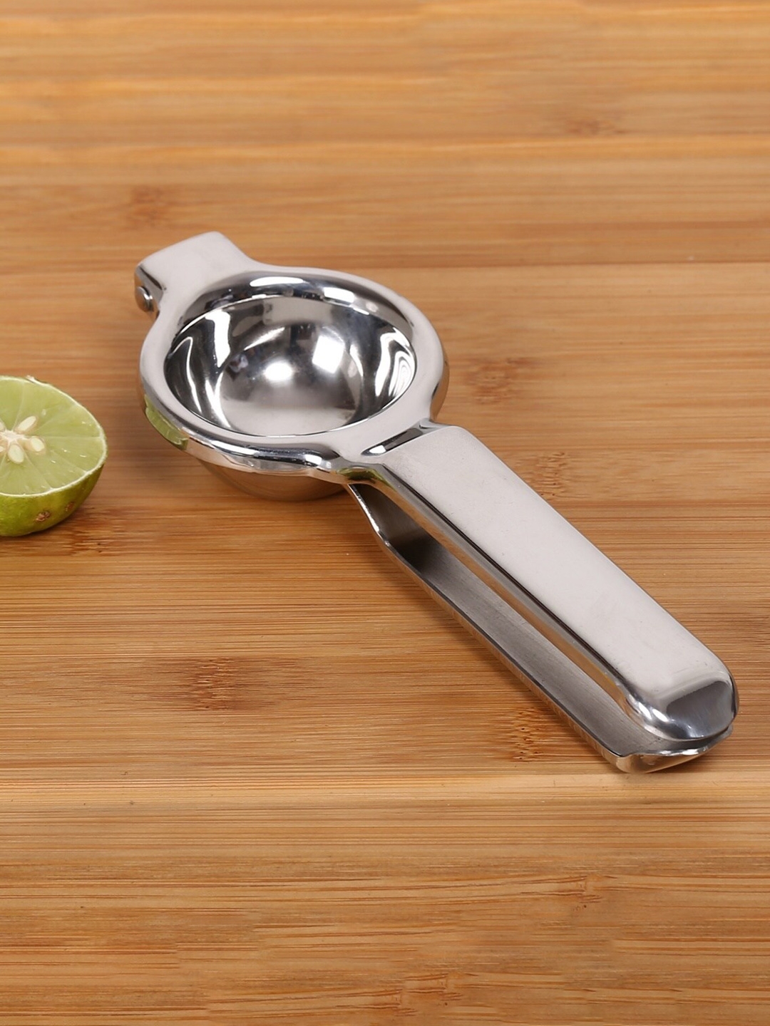 Home Centre  Silver -Toned Solid Stainless Steel Lemon Squeezer