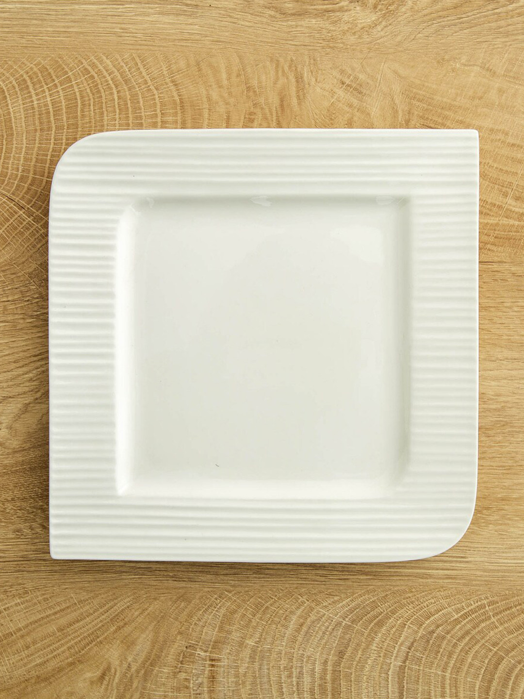Home Centre White 1 Piece Porcelain Glossy Dinner Plate