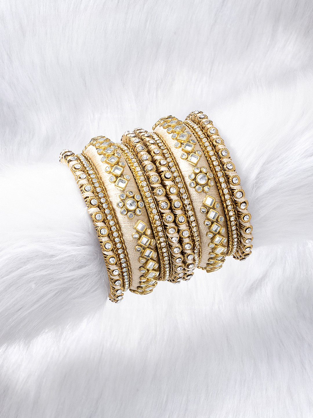 Peora Set Of 10 Cream Coloured Gold-Plated Stone Studded Silk Thread Bangle Set