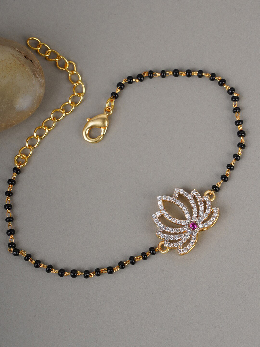 Shimmering Floret CZ Silver Studded Mangalsutra Bracelet with Black Beads Gold Plated Chain