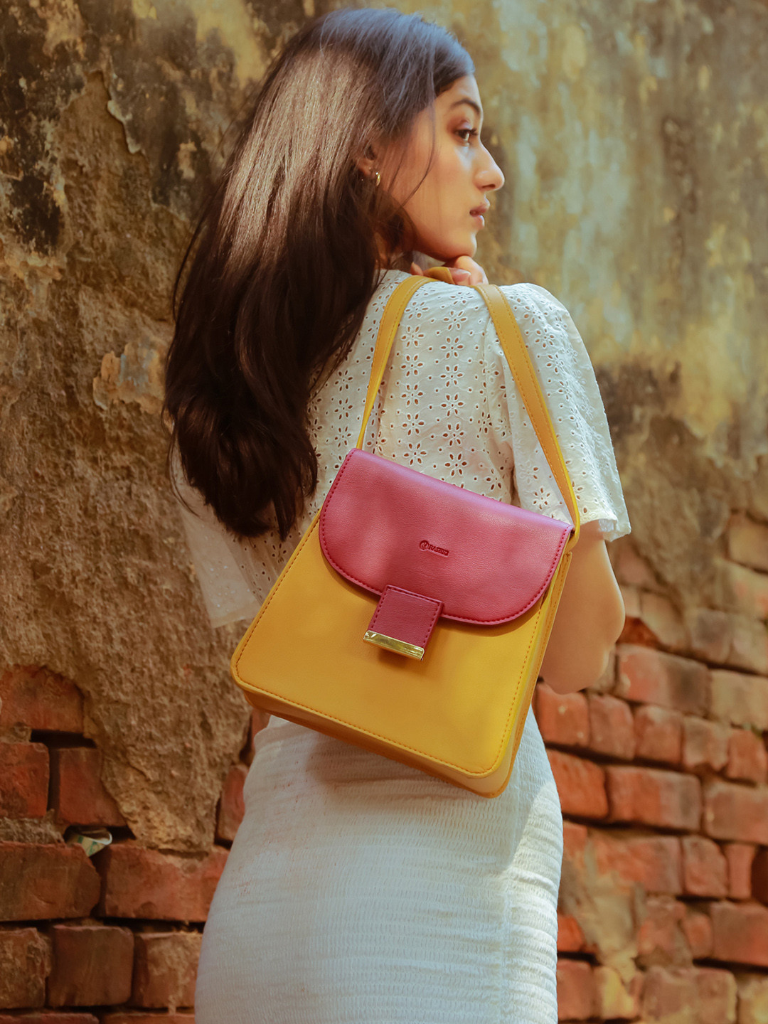 RASHKI Mustard Colourblocked PU Structured Sling Bag with Tasselled