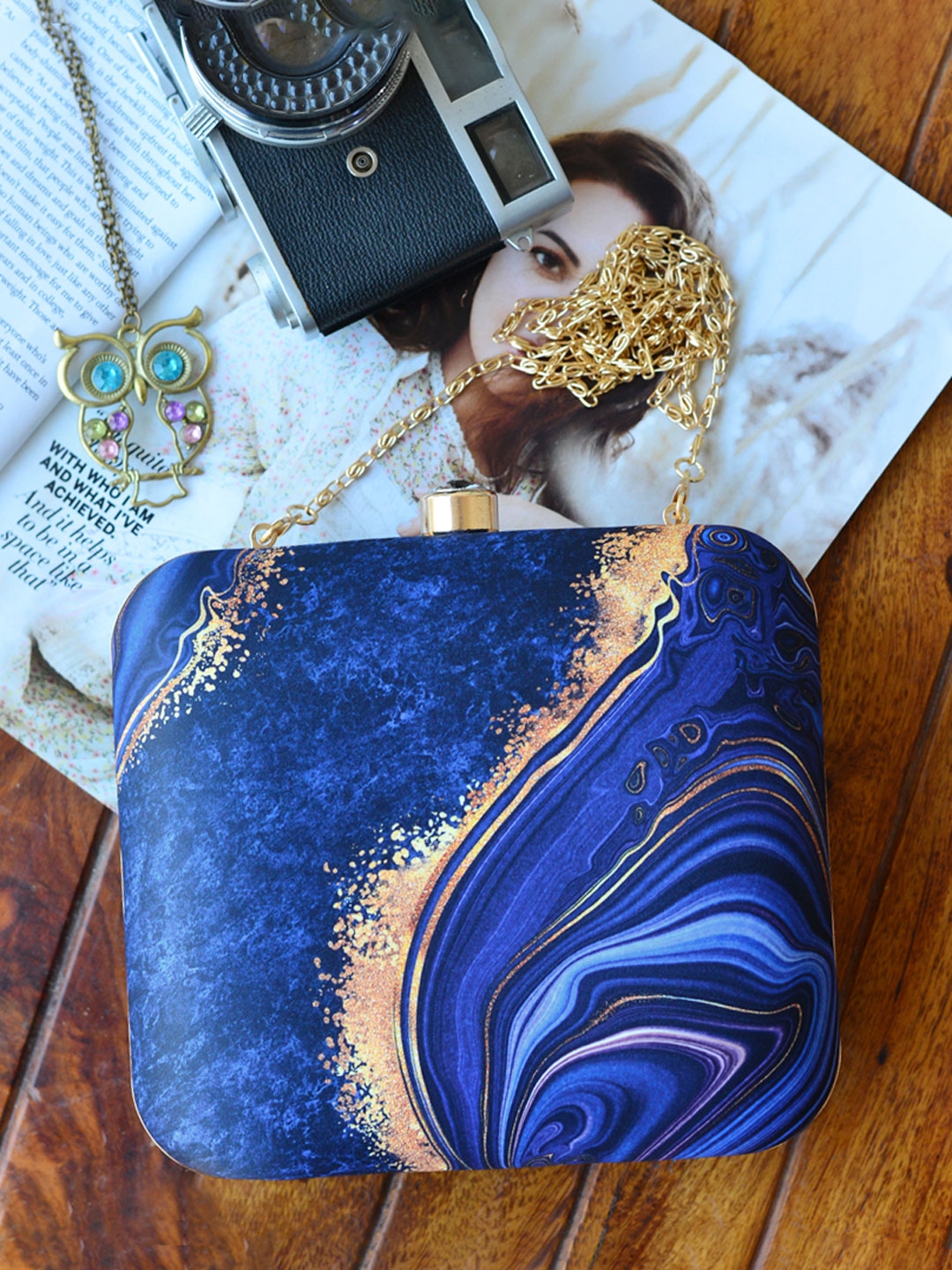 Blue and yellow clutch bag hotsell