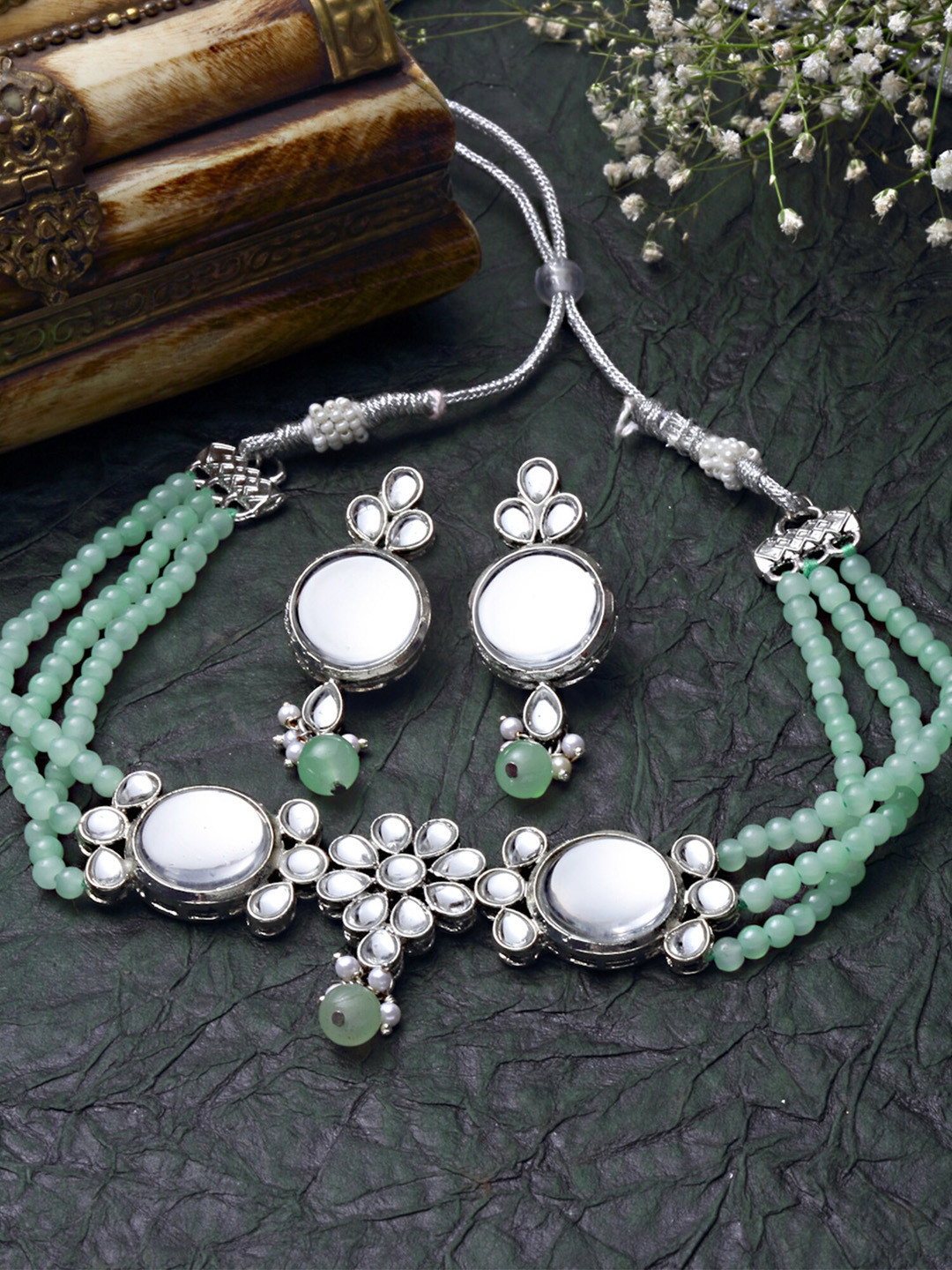 KARATCART Silver-Plated Lime Green & White Kundan Studded & Beaded Oxidised Jewellery Set