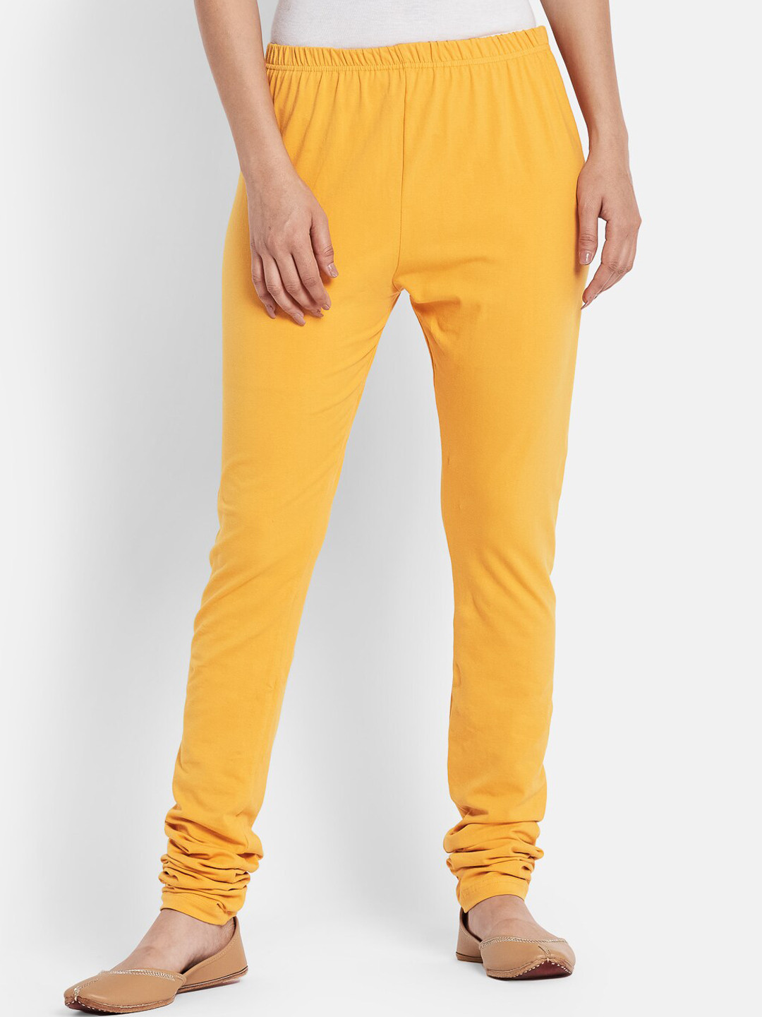 Fabindia Women Mustard Yellow Solid Churidar Length Leggings