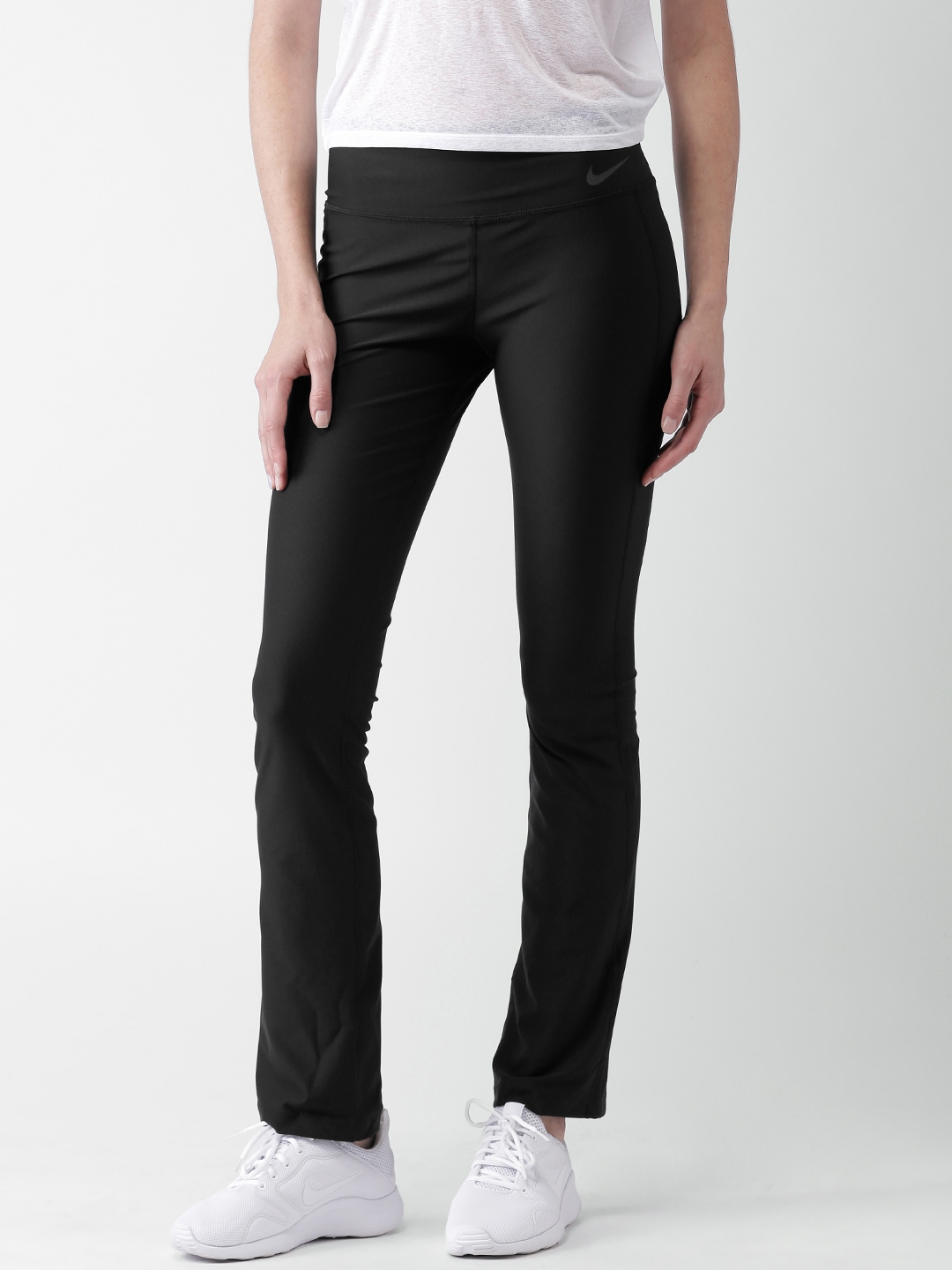 Nike legend slim fit pants sales