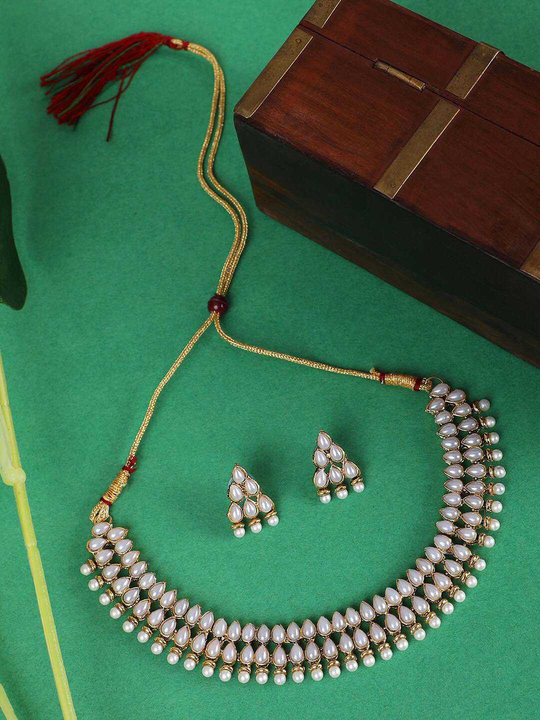 ANIKAS CREATION Gold Plated Tear Drop Shaped Pearls Studded Jewellery Set