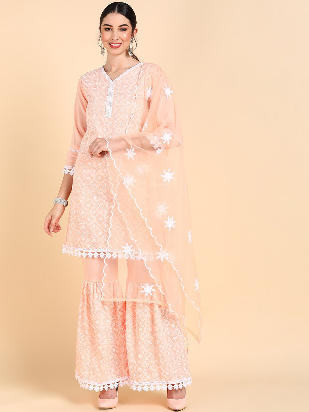 AHIKA Women Orange Floral Embroidered Kurti with Sharara & With Dupatta
