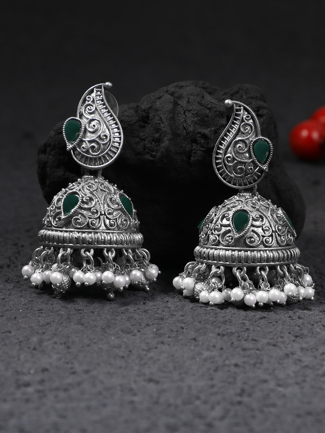 Oxidized Silver-Toned Paisley Motif Green Stone Studded Jhumka Earrings with Pearls