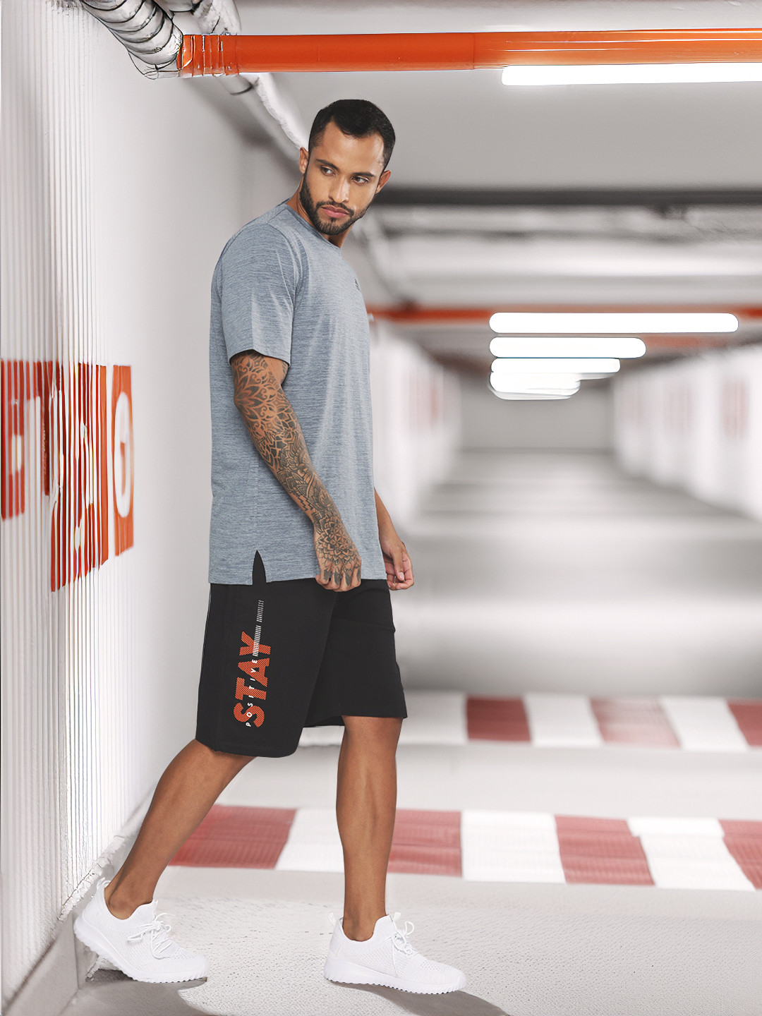 HRX by Hrithik Roshan Men Black & Orange Typography Printed Shorts