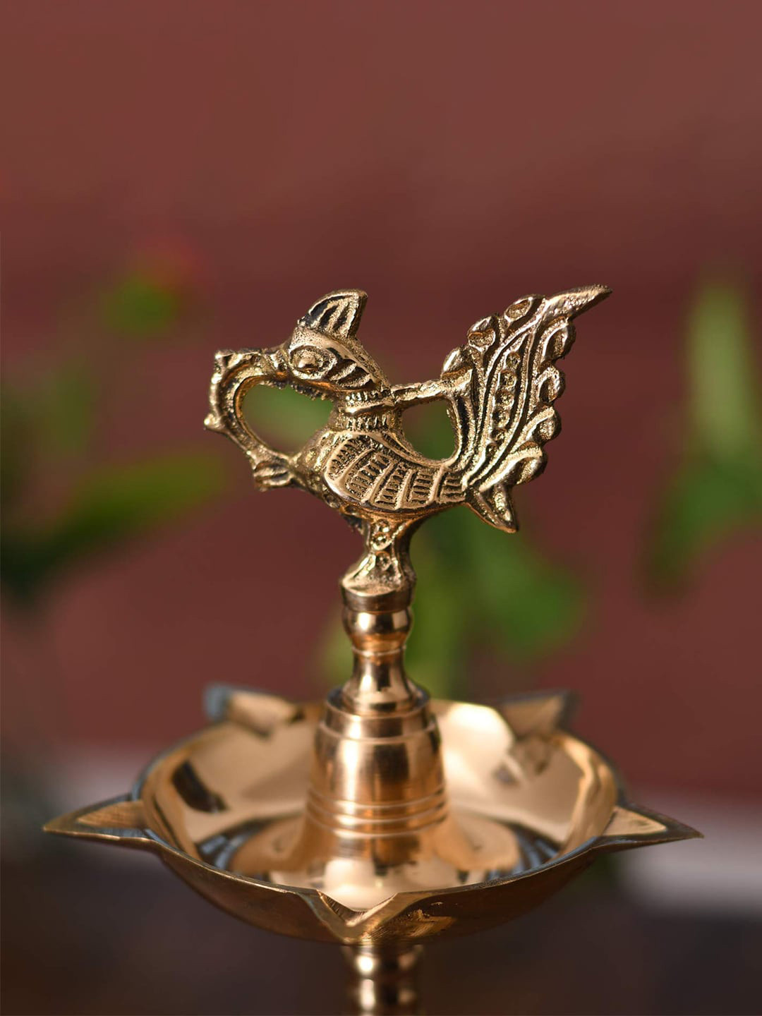 Craftvatika Gold-Toned Brass Peacock Mahabharat Diya