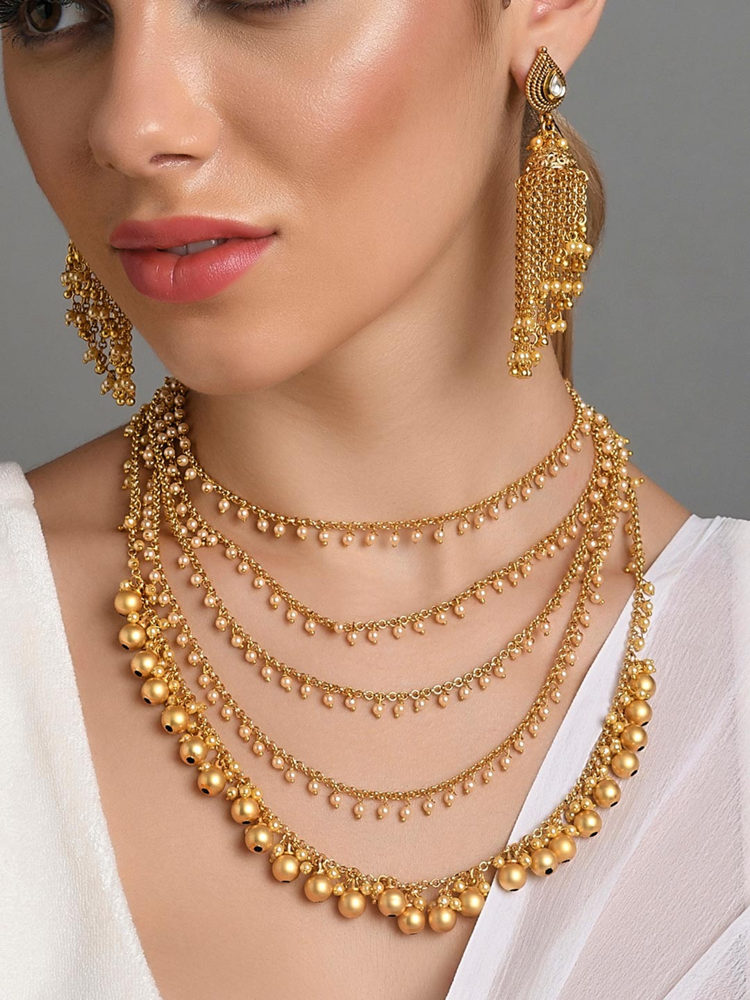 Fida Gold -Plated White Stone Studded & Pearl Multi-Layered Jewellery Set
