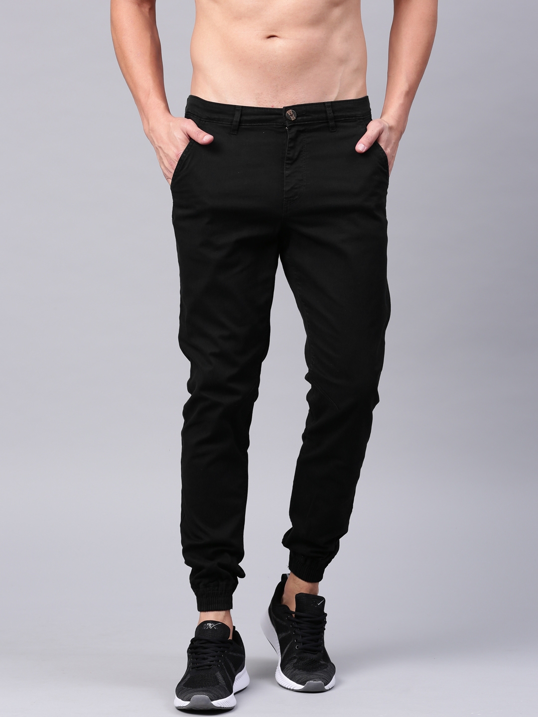 Buy HRX By Hrithik Roshan Men Black Solid Joggers  Trousers for Men  1829942  Myntra