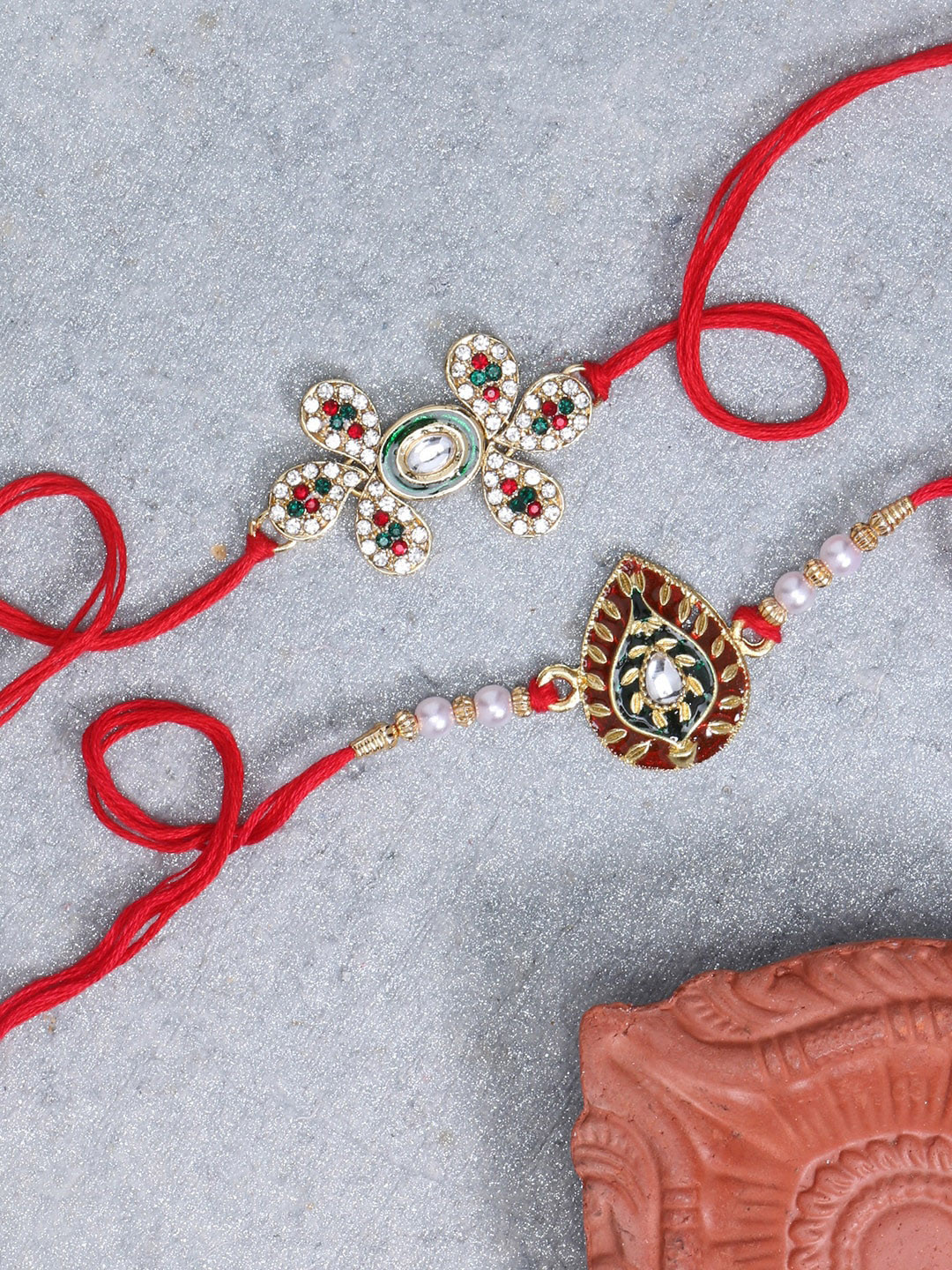 LIVE EVIL Pack Of 2 Gold Plated Maroon Meena Work Rakhi