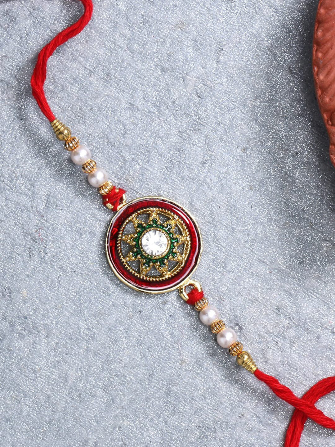 LIVE EVIL Gold-Plated Maroon Meena Work Rakhi