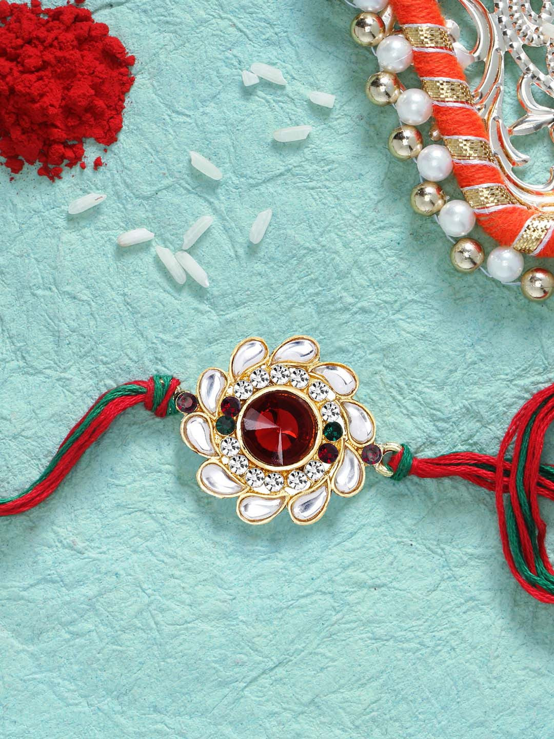 LIVE EVIL Gold-Plated Red Kundan Studded Rakhi