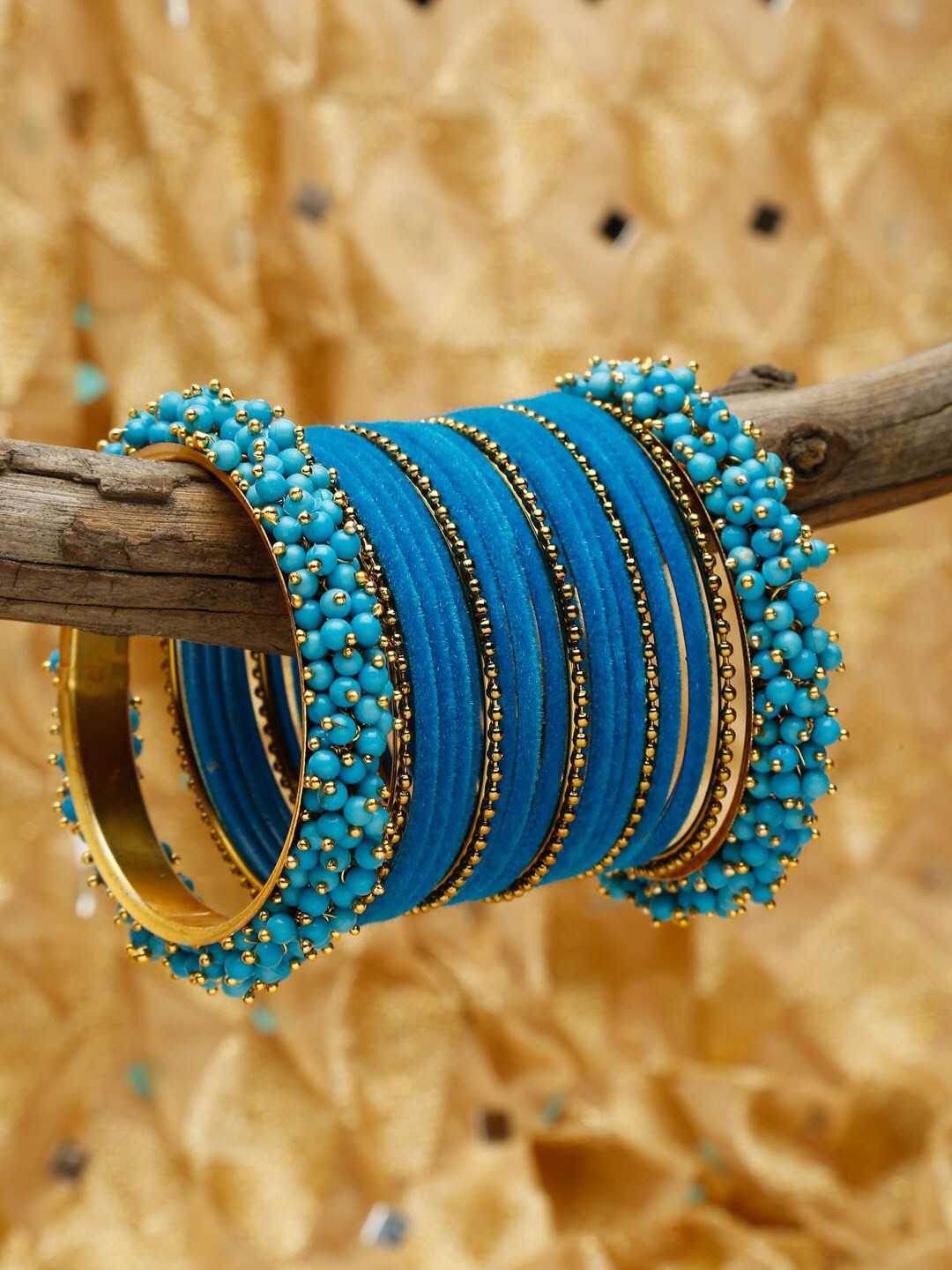 Shining Diva Blue Set Of 23 Gold Plated Bangles