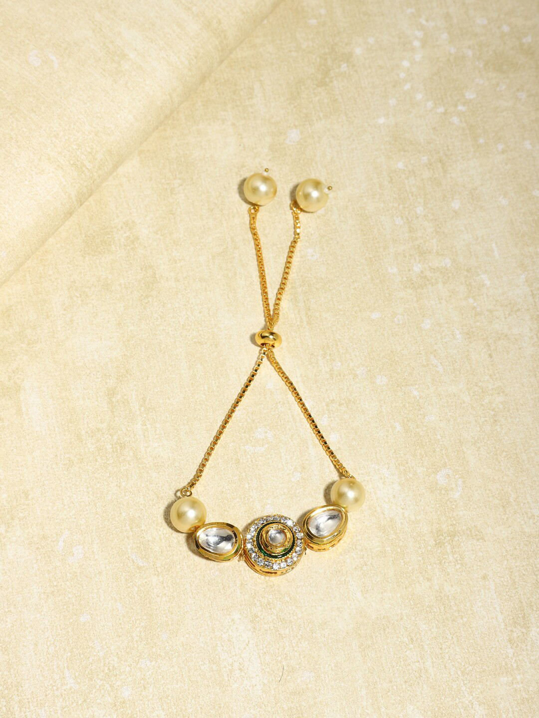 Ruby Raang Women  Gold-Plated White Brass Kundan Charm Bracelet