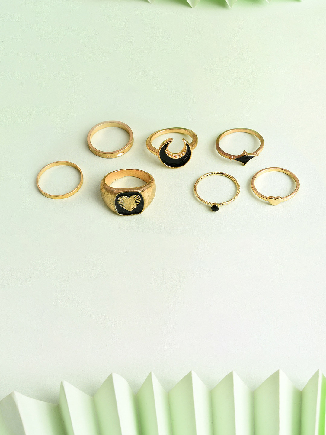 SOHI  Set of 7 Gold-Plated Black Stone Studded Finger Ring