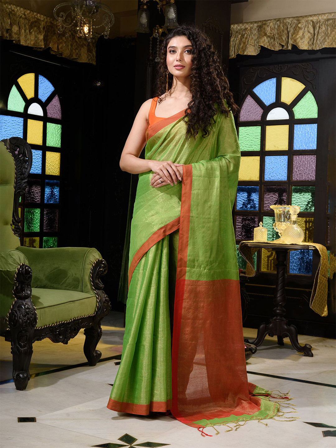 Charukriti Green & Orange Solid  Soft Tissue Saree