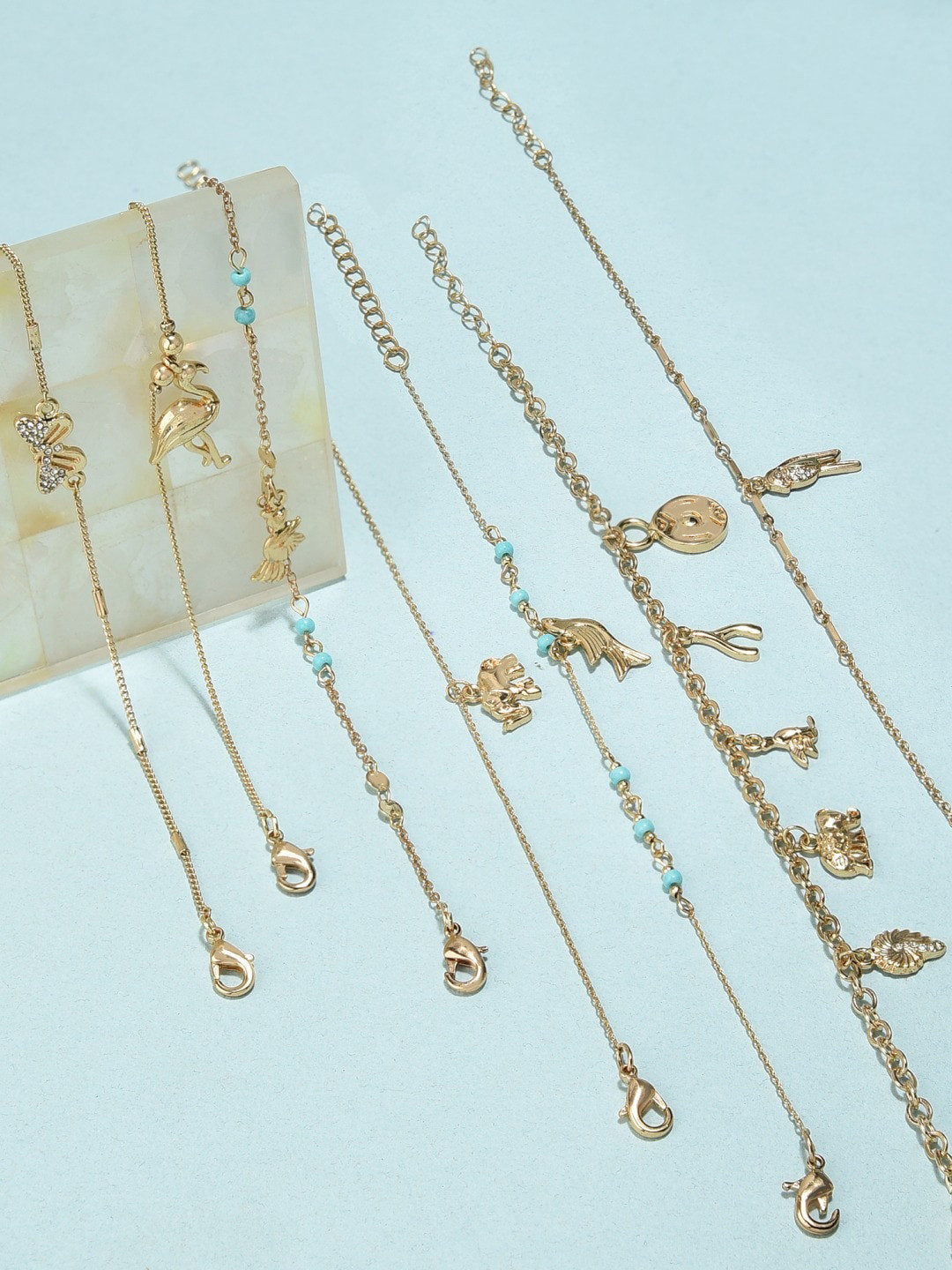 AMI Women Set of 7 Gold Tone Contemporary Classy Stackable Bracelets