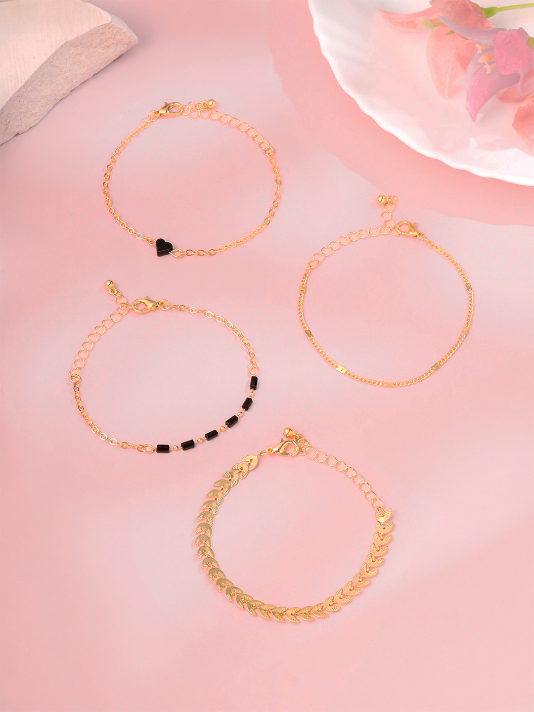 Unwind by Yellow Chimes Set of 4 Gold Plated Black Beads Bracelets