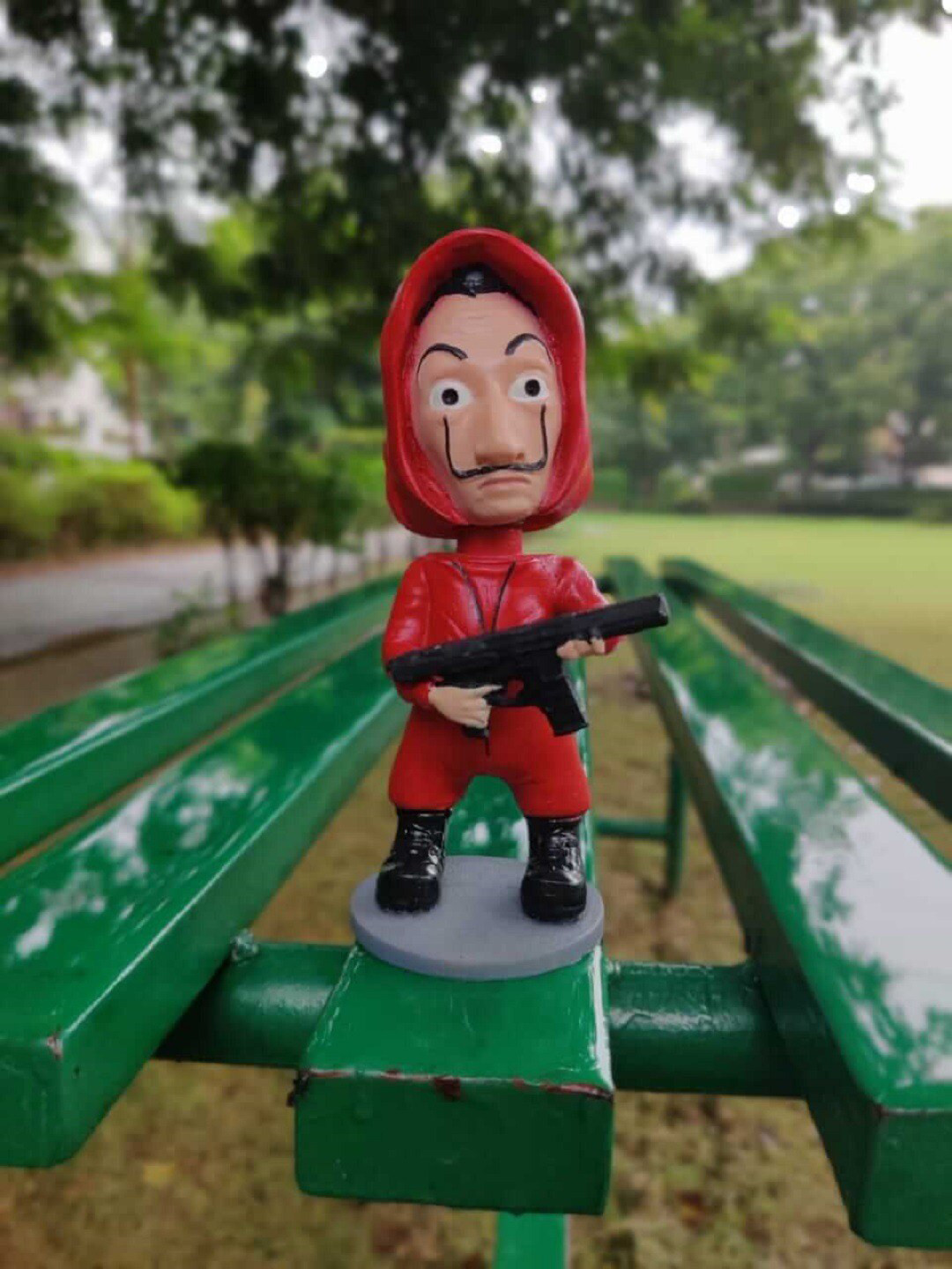 Awestuffs Money Heist Red Polyresin Matte Living Room Medium Showpiece - 5.5 Inches