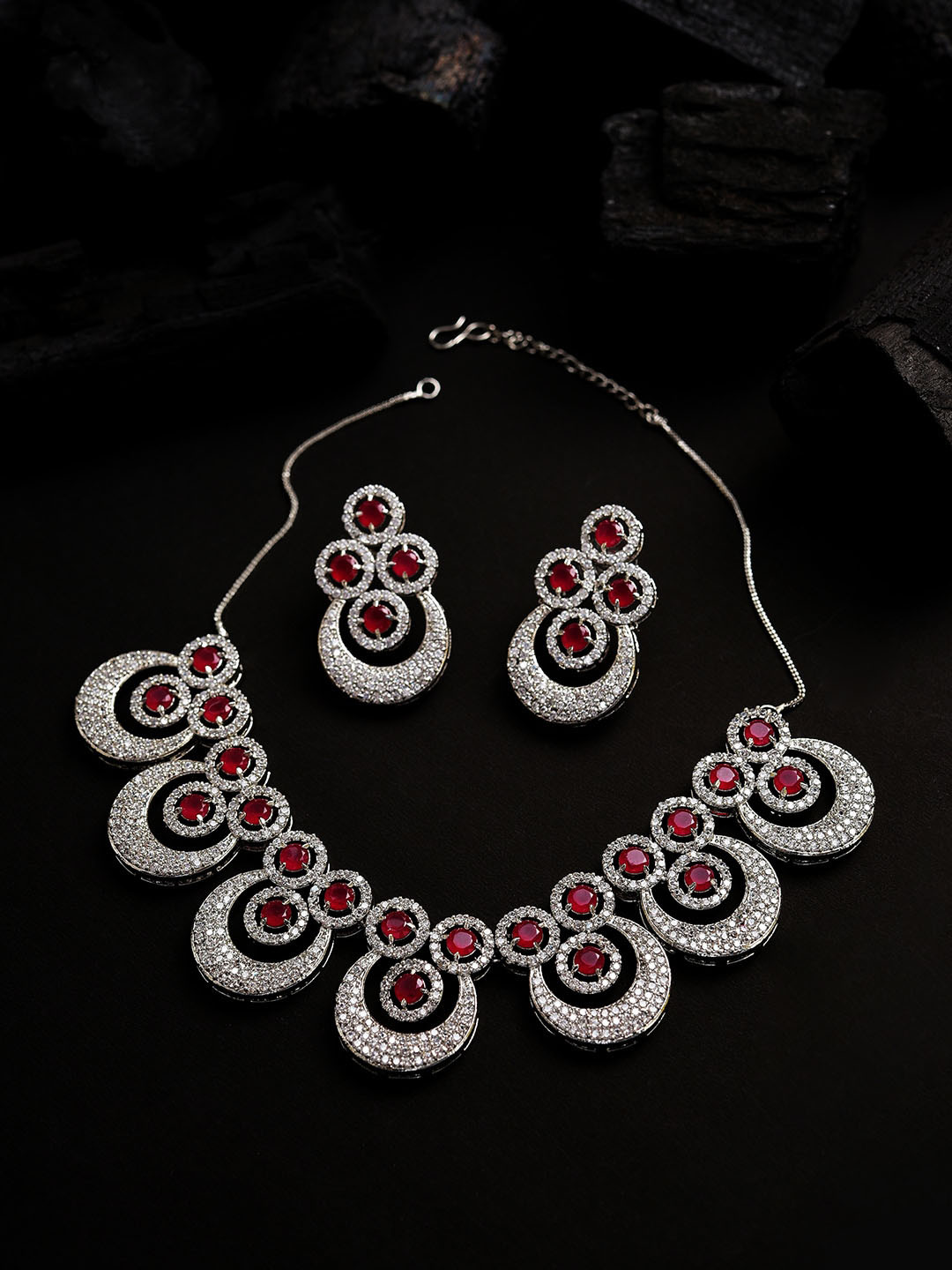 SOHI Silver Plated Pink Colored White Artificial Stone Studded Jewellery Set