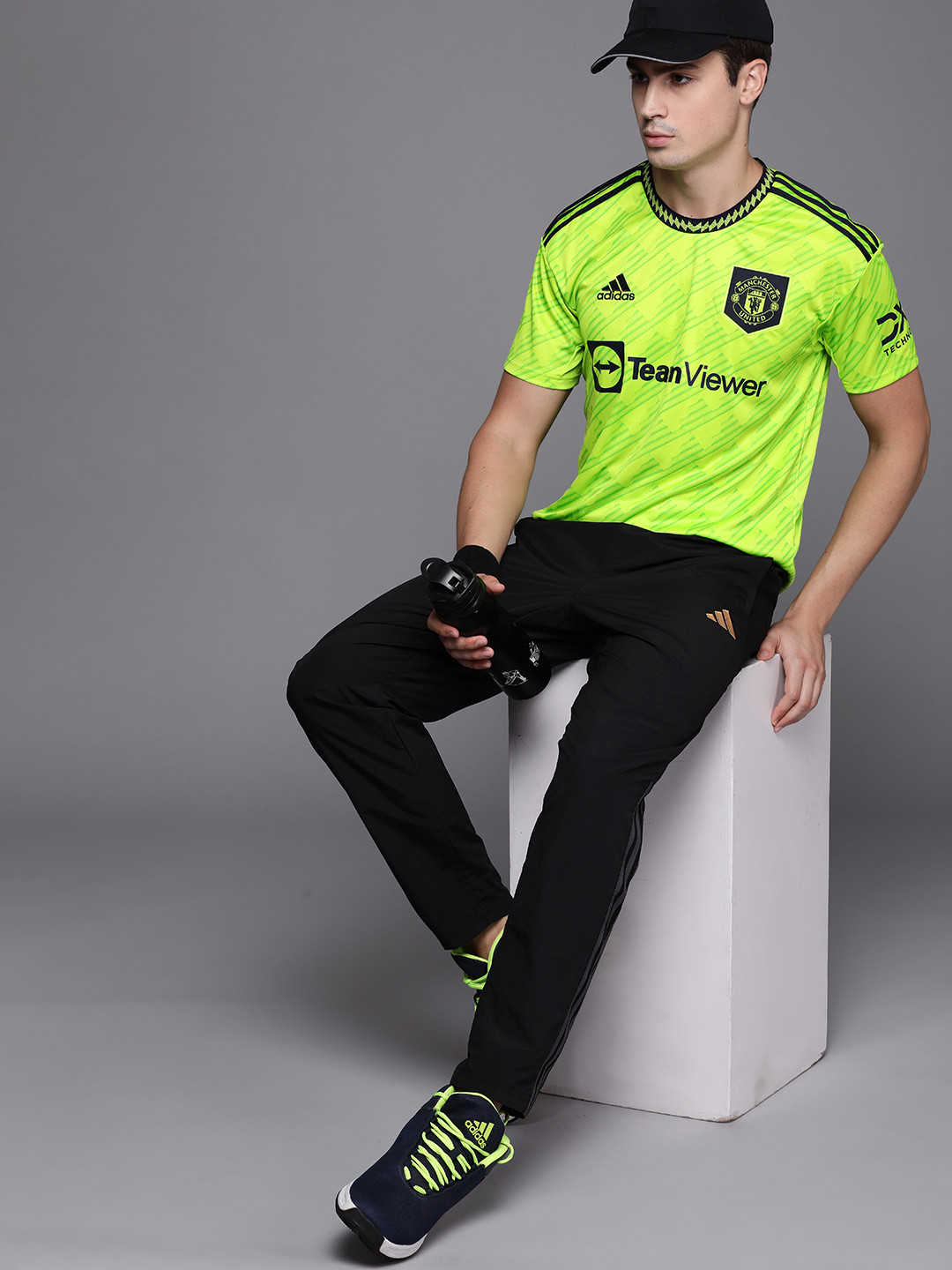 black and lime green adidas shirts