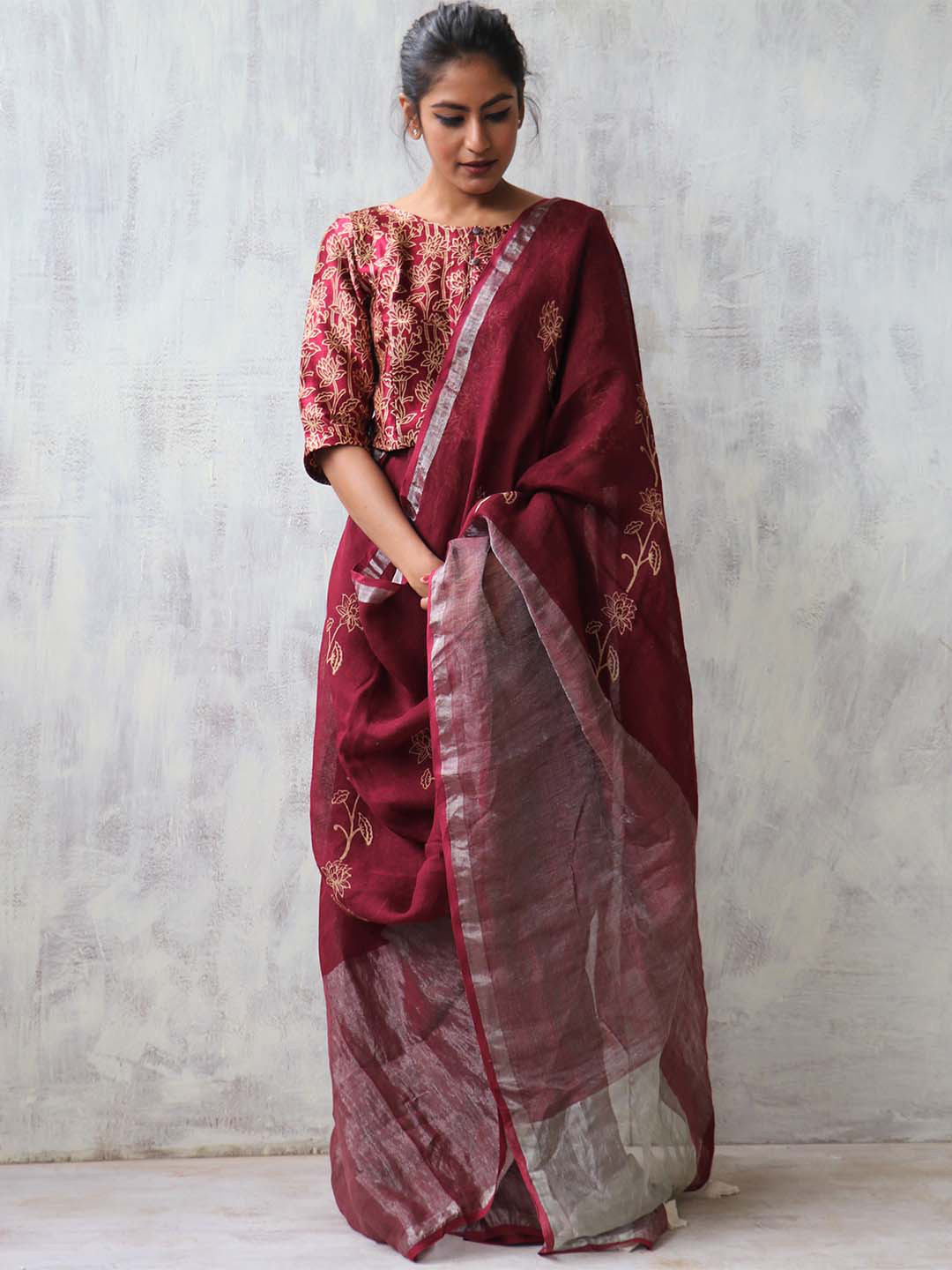 Chidiyaa Maroon Floral Pure Linen Saree